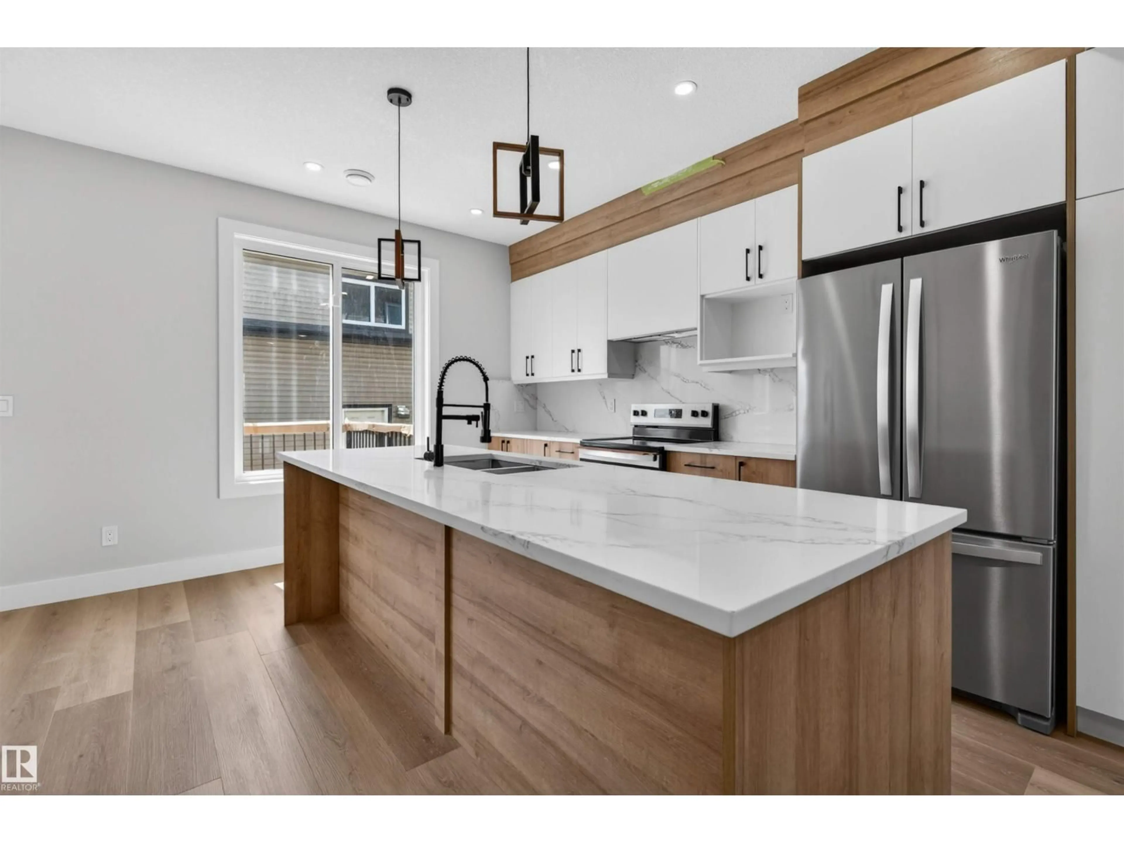 Open concept kitchen, unknown for NW - 10707-09 128 AV, Edmonton Alberta T5E0J4