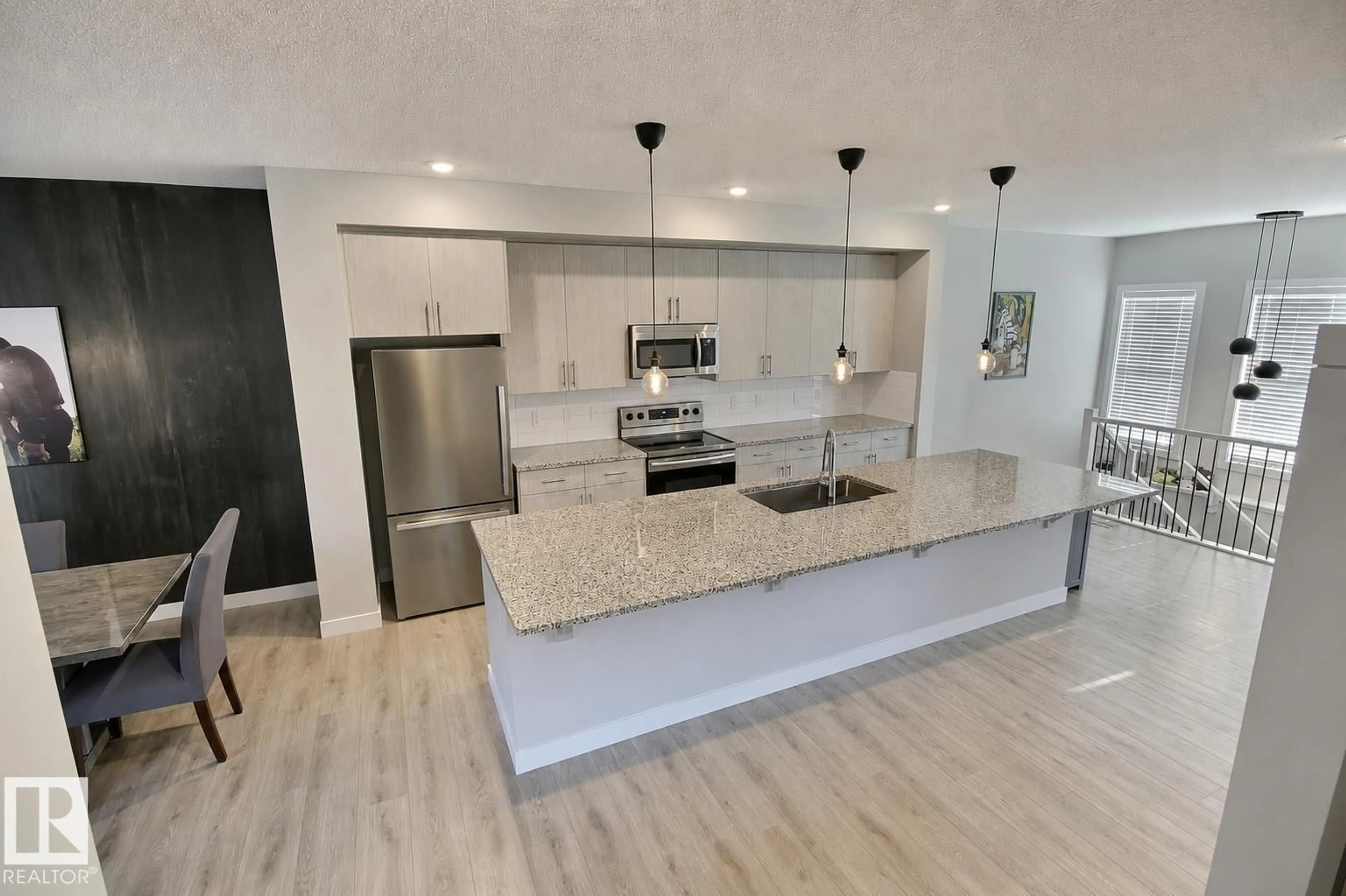 Open concept kitchen, ceramic/tile floor for 17455 77 ST, Edmonton Alberta T5Z0R4