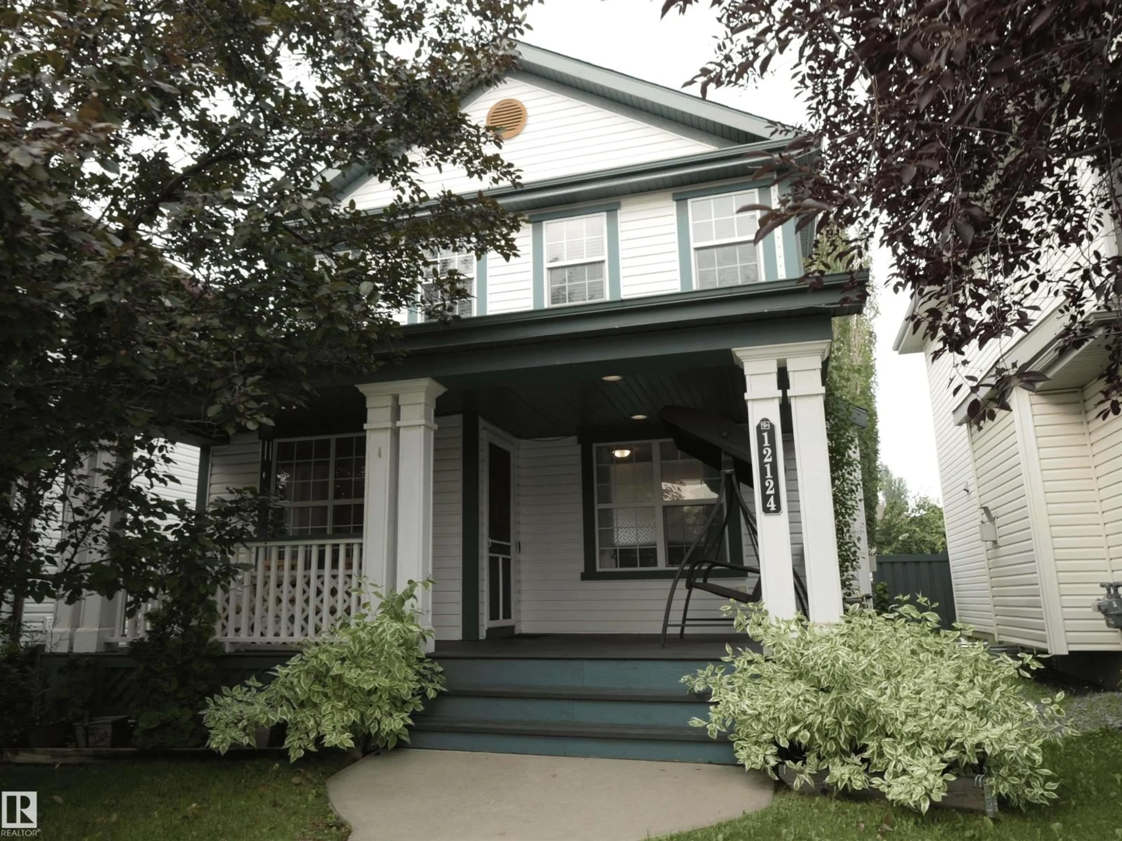 Home with vinyl exterior material, street for SW - 12124 17 AV, Edmonton Alberta T6W1M1