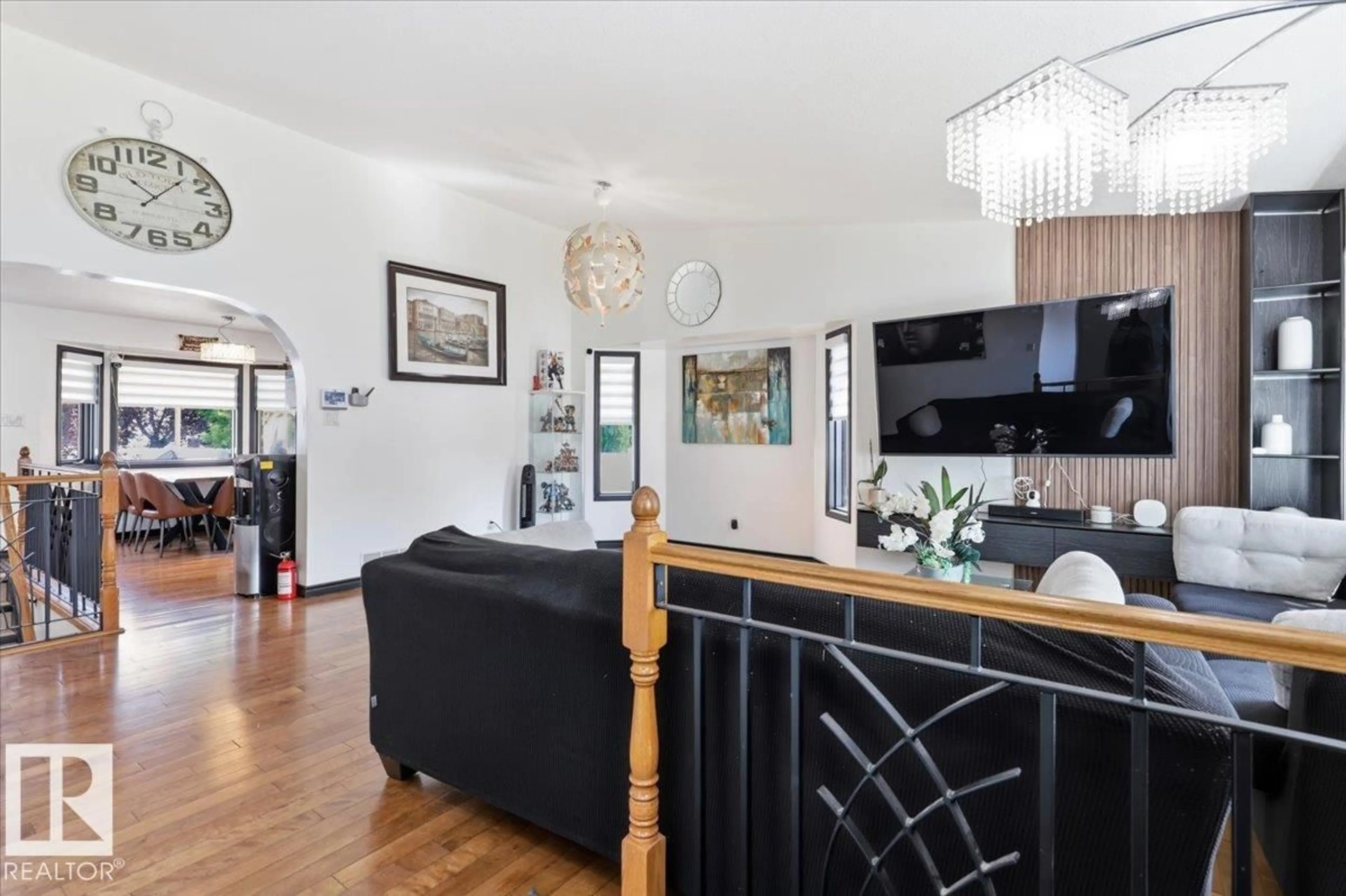 Living room with furniture, wood/laminate floor for 242 NORTHMOUNT DR, Wetaskiwin Alberta T9A3M4