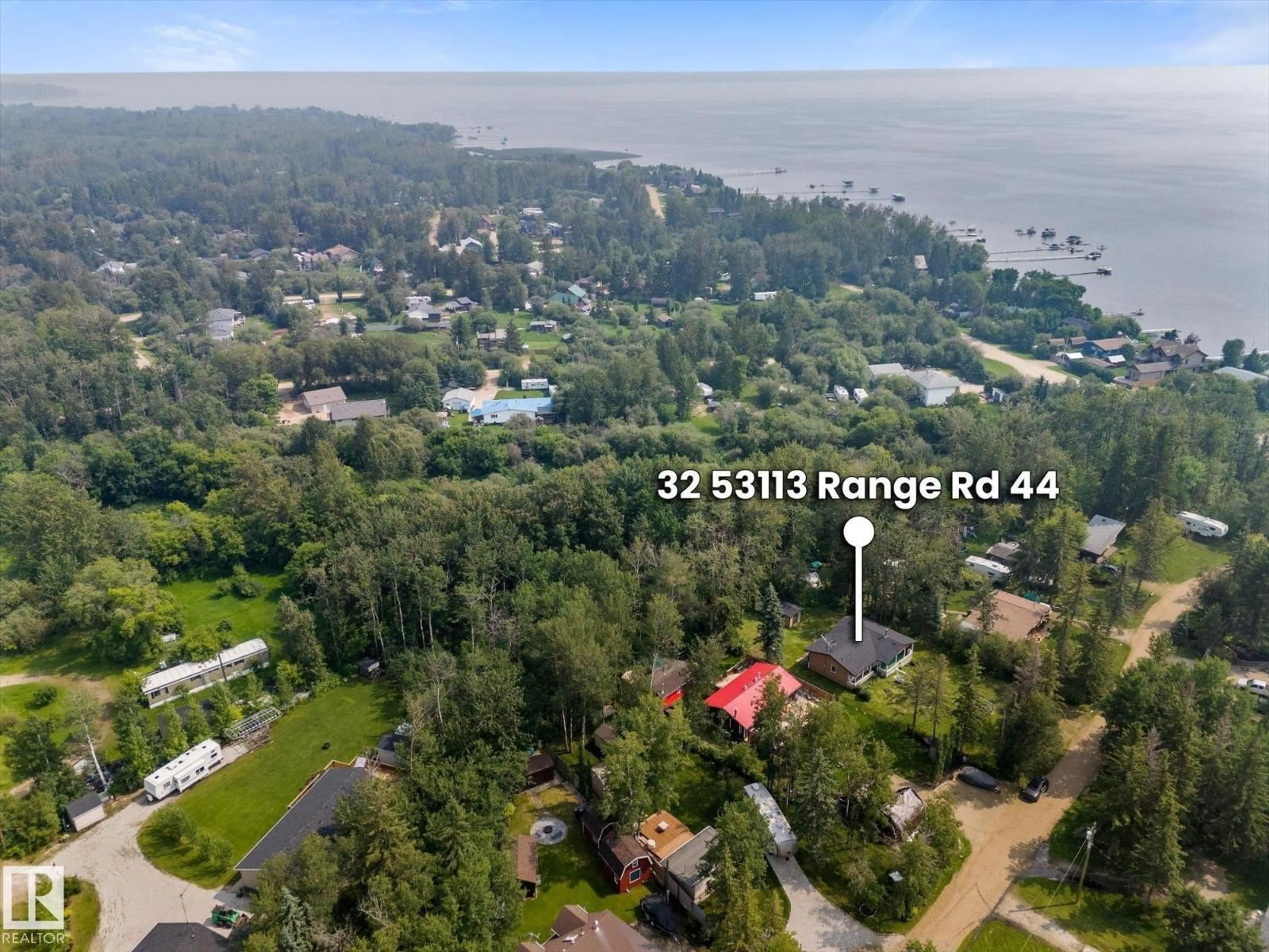 A pic from outside/outdoor area/front of a property/back of a property/a pic from drone, water/lake/river/ocean view for 53113 - 32 RGE ROAD 44, Rural Parkland County Alberta T0E2K0