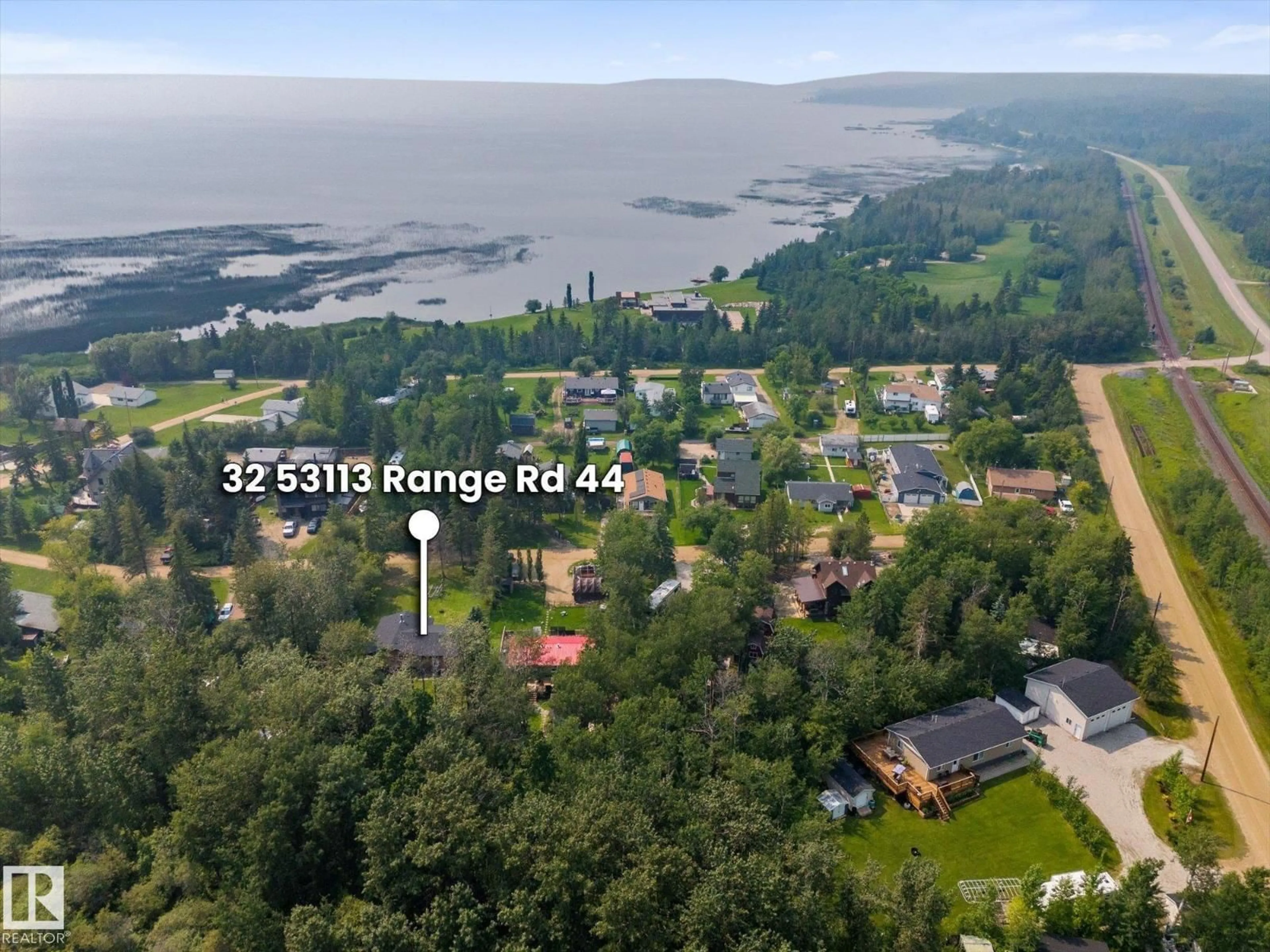 A pic from outside/outdoor area/front of a property/back of a property/a pic from drone, water/lake/river/ocean view for 53113 - 32 RGE ROAD 44, Rural Parkland County Alberta T0E2K0