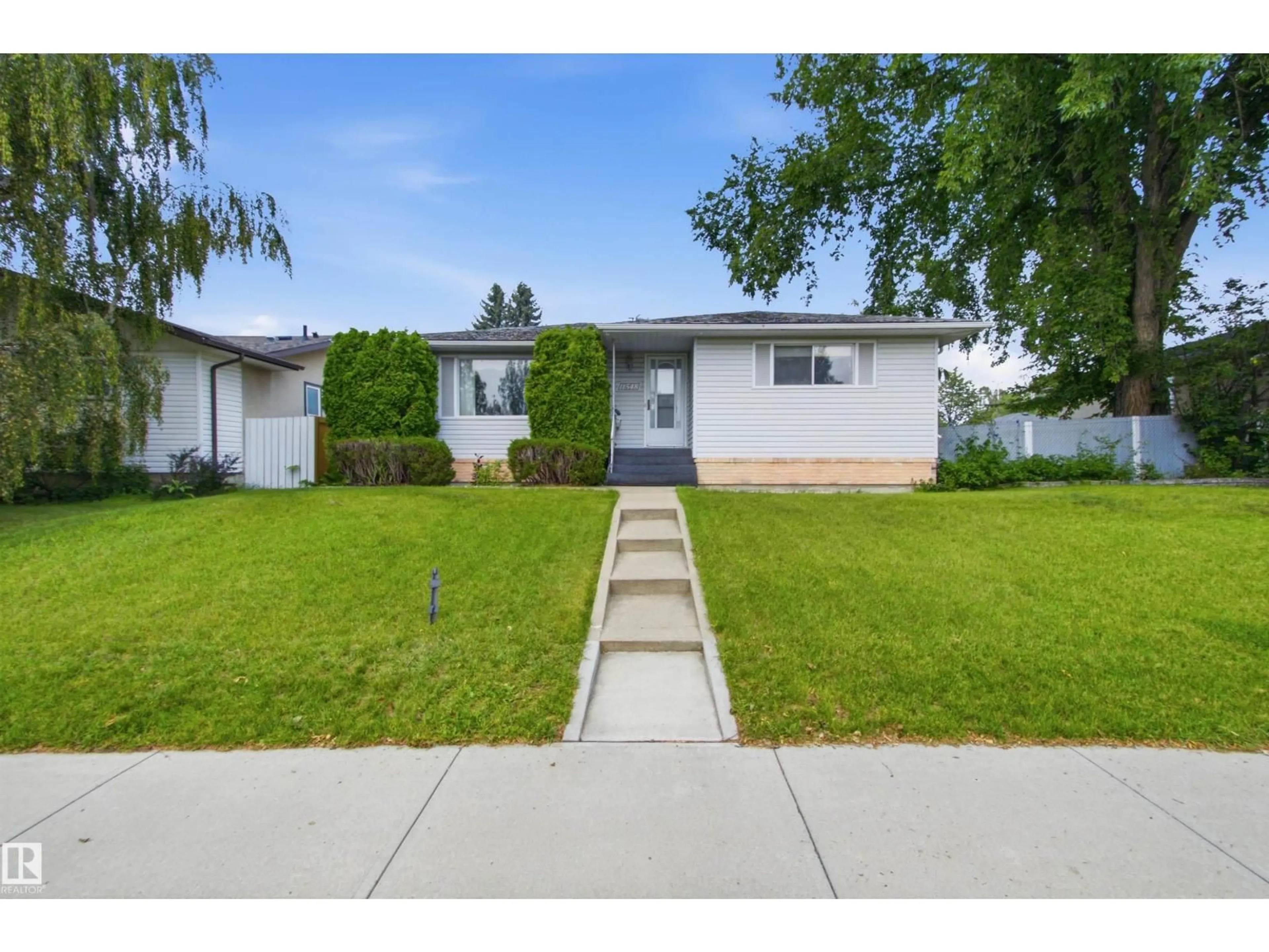 Home with vinyl exterior material, street for NW - 11548 41 AV, Edmonton Alberta T6J0V1