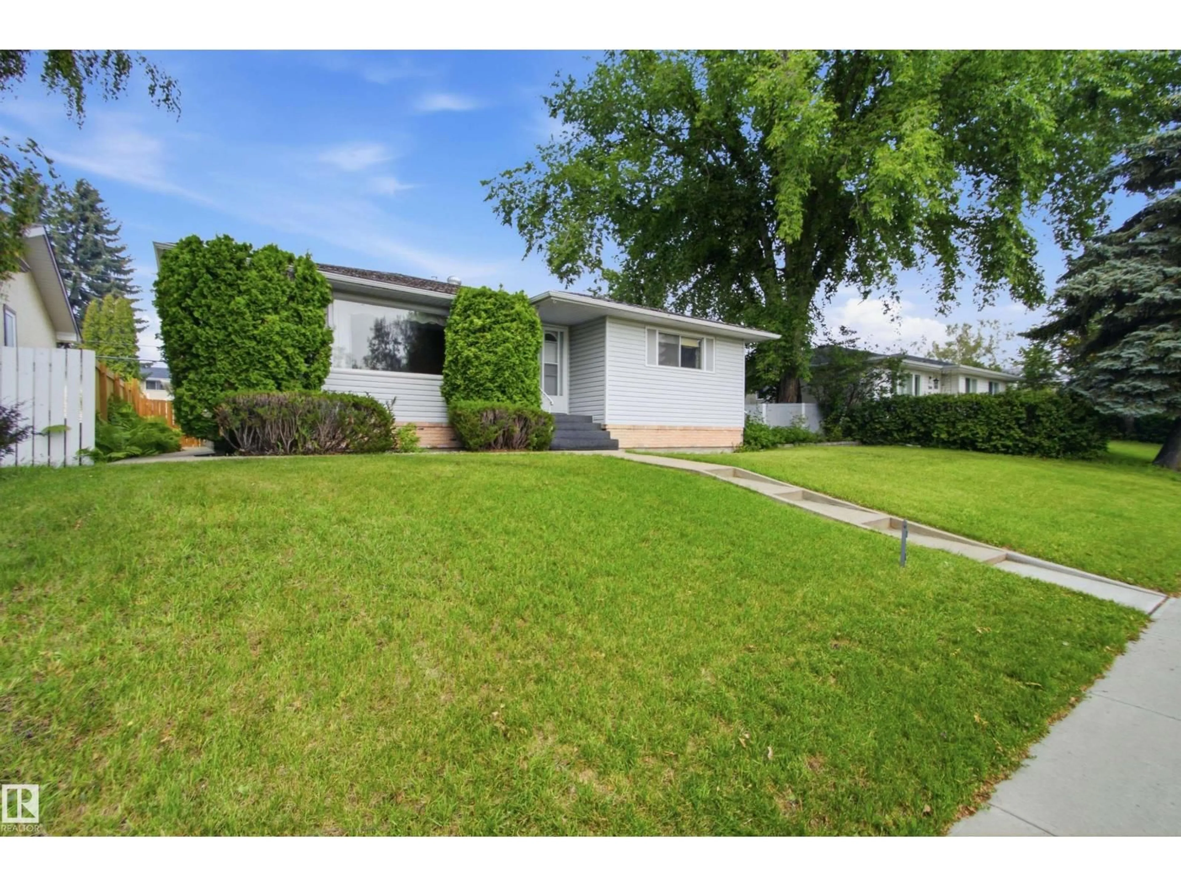 Home with vinyl exterior material, street for NW - 11548 41 AV, Edmonton Alberta T6J0V1