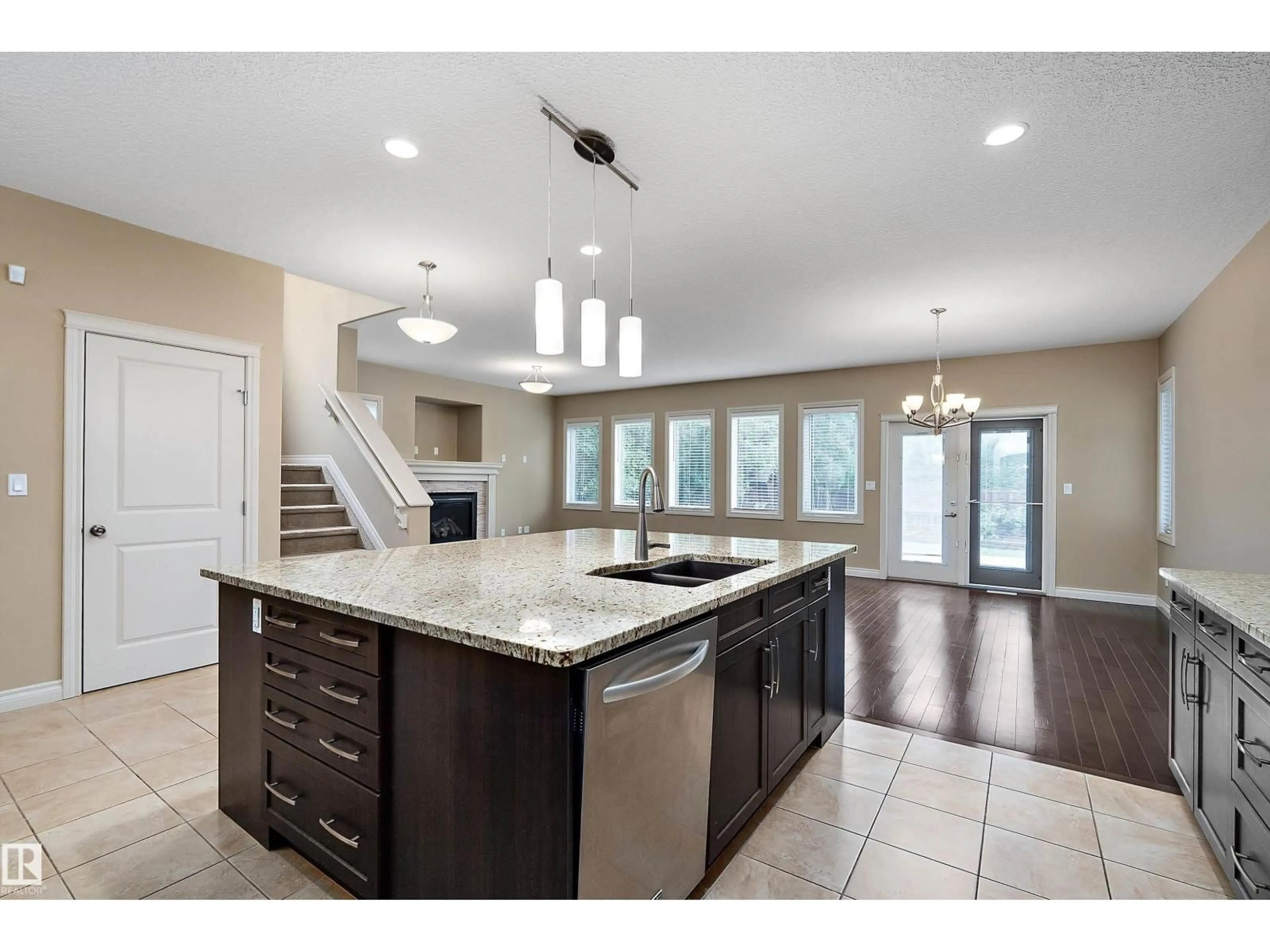 Open concept kitchen, ceramic/tile floor for 11203 72 AV, Edmonton Alberta T6G0B4