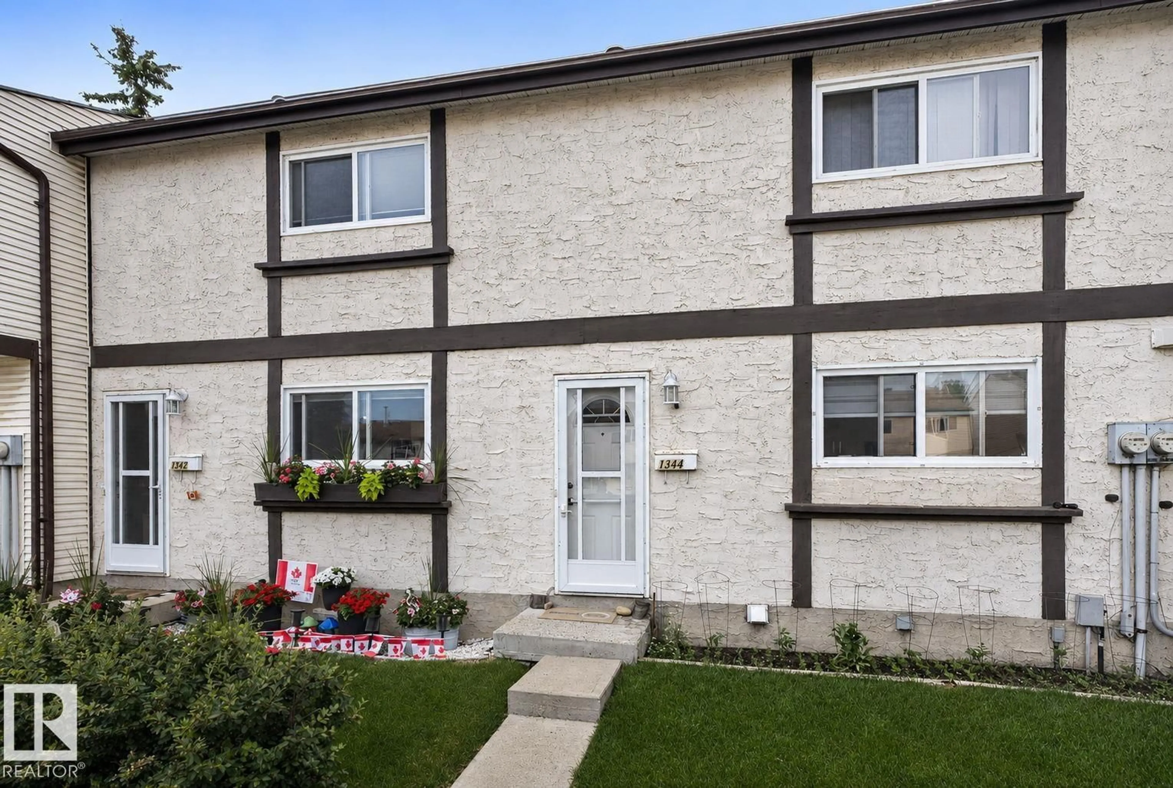 Home with vinyl exterior material, street for 1344 LAKEWOOD ROAD, Edmonton Alberta T6K3P2