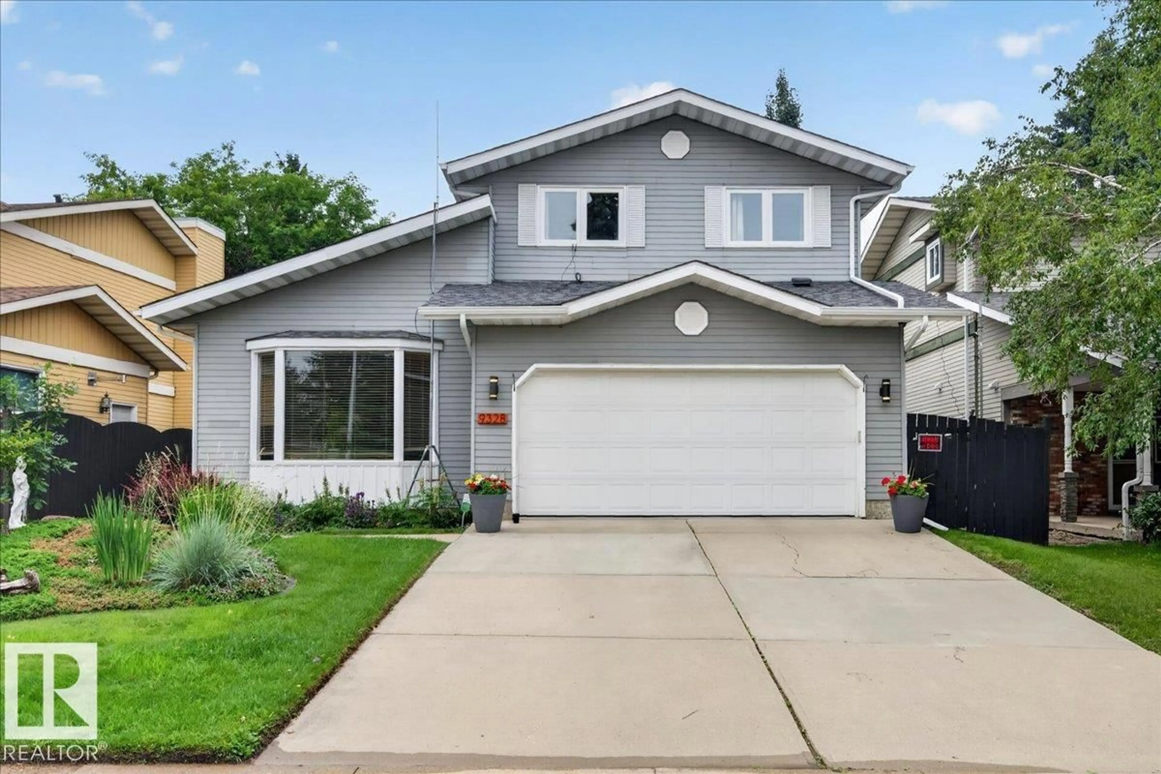 Home with vinyl exterior material, street for 9328 173 ST, Edmonton Alberta T5T3C5