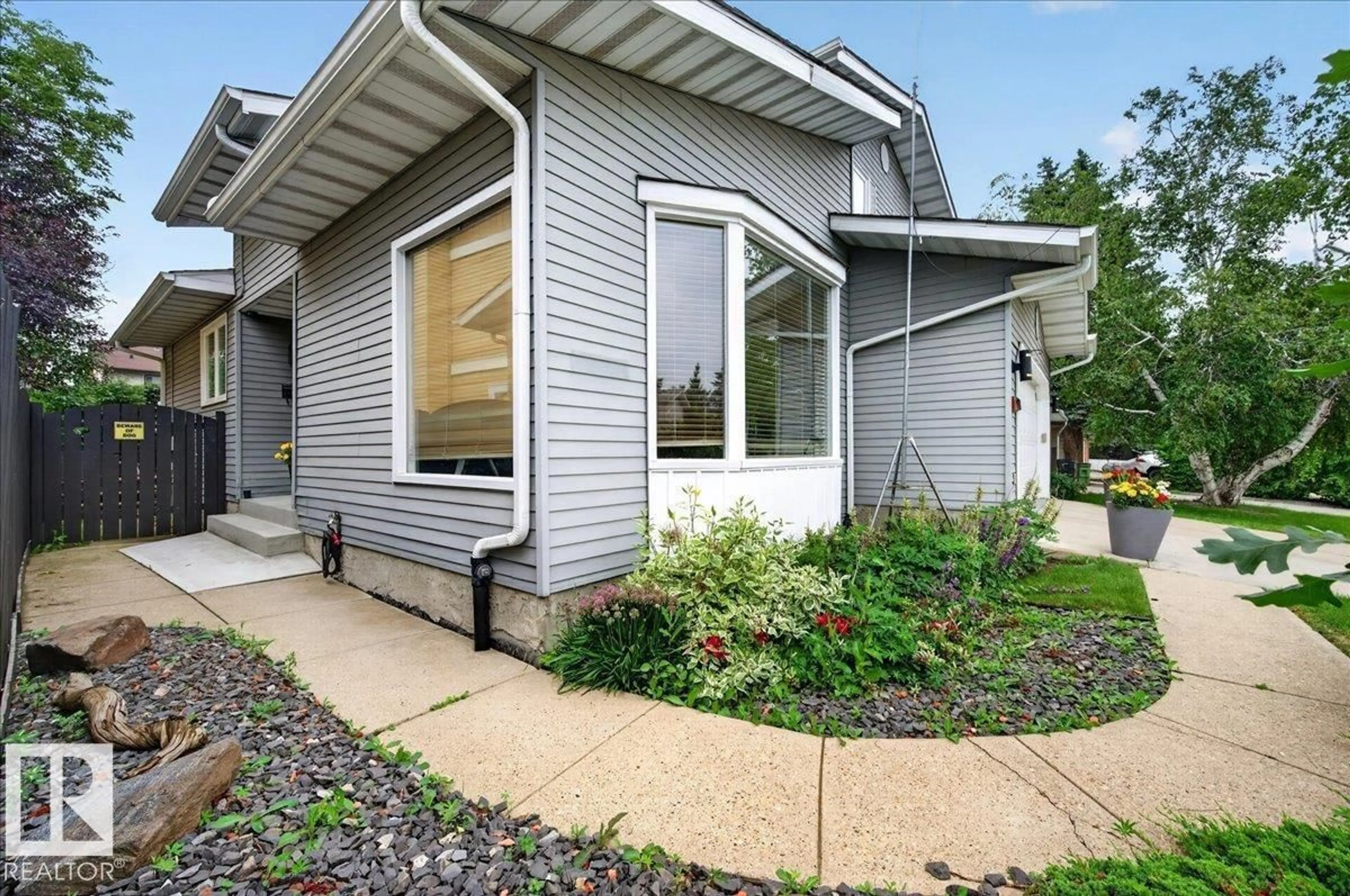 Home with vinyl exterior material, street for 9328 173 ST, Edmonton Alberta T5T3C5