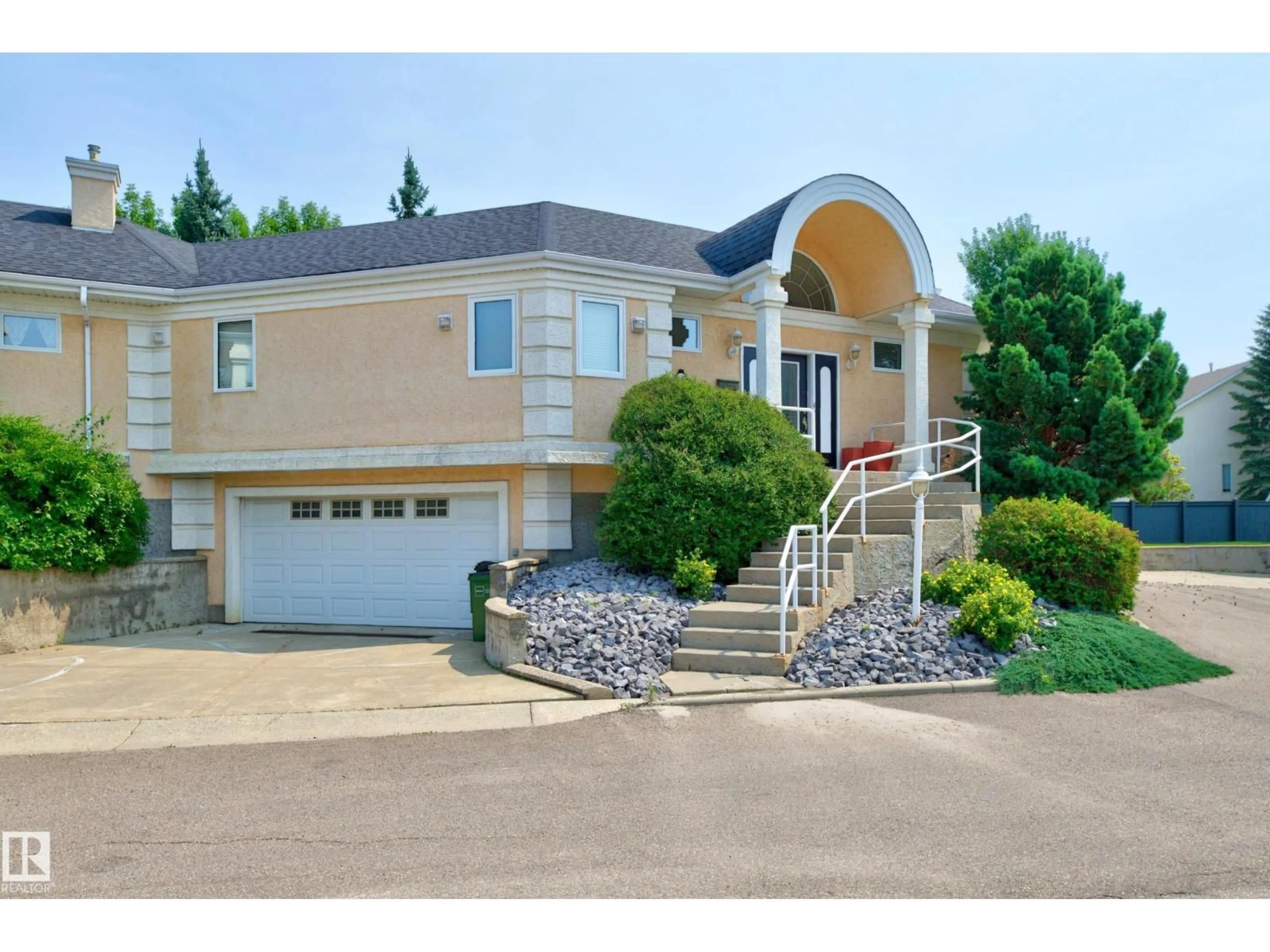 Home with vinyl exterior material, street for #4 - 11809 9B AV, Edmonton Alberta T6J7B6