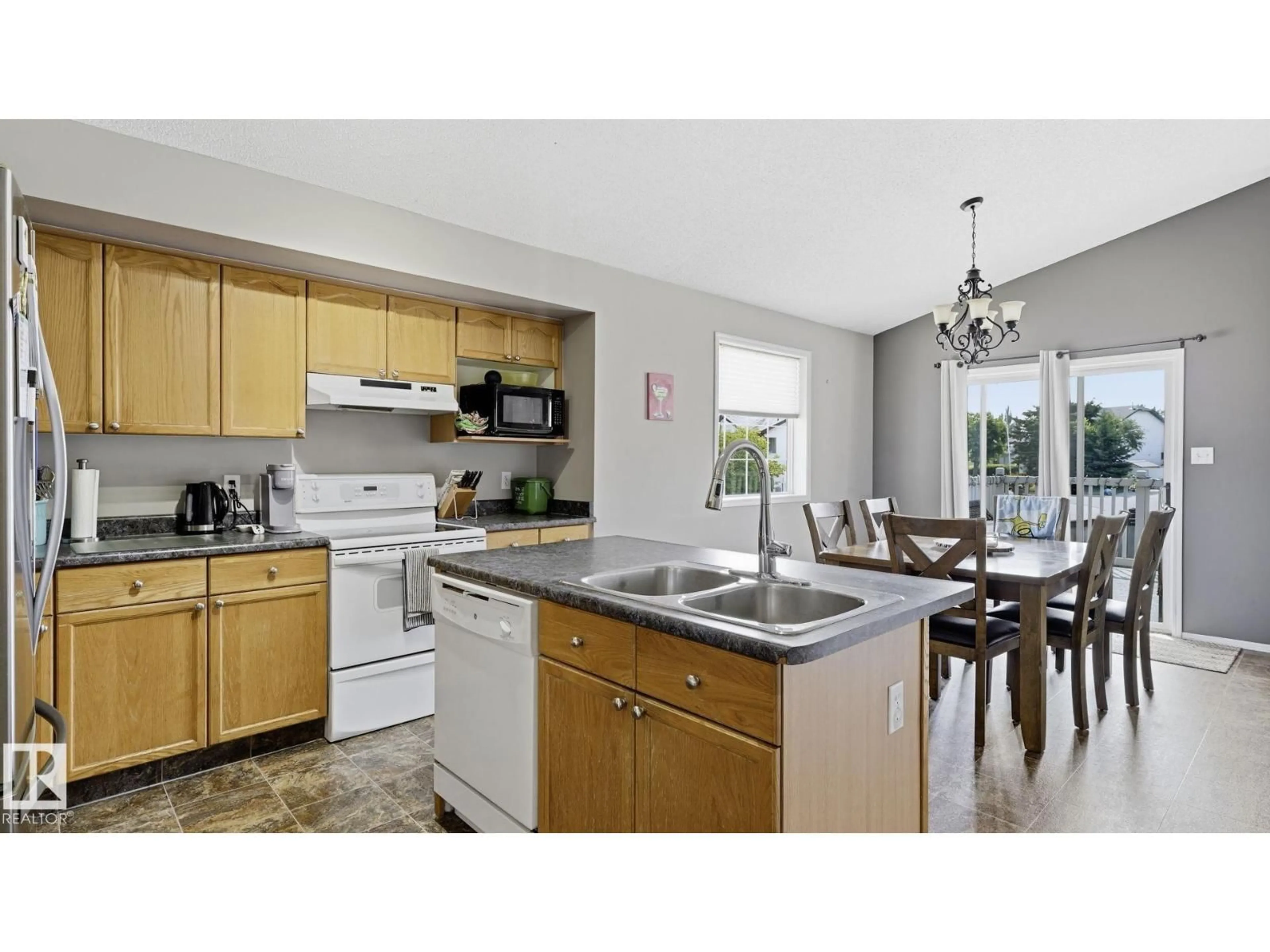 Open concept kitchen, unknown for 4105 36A AV, Edmonton Alberta T6L7B1