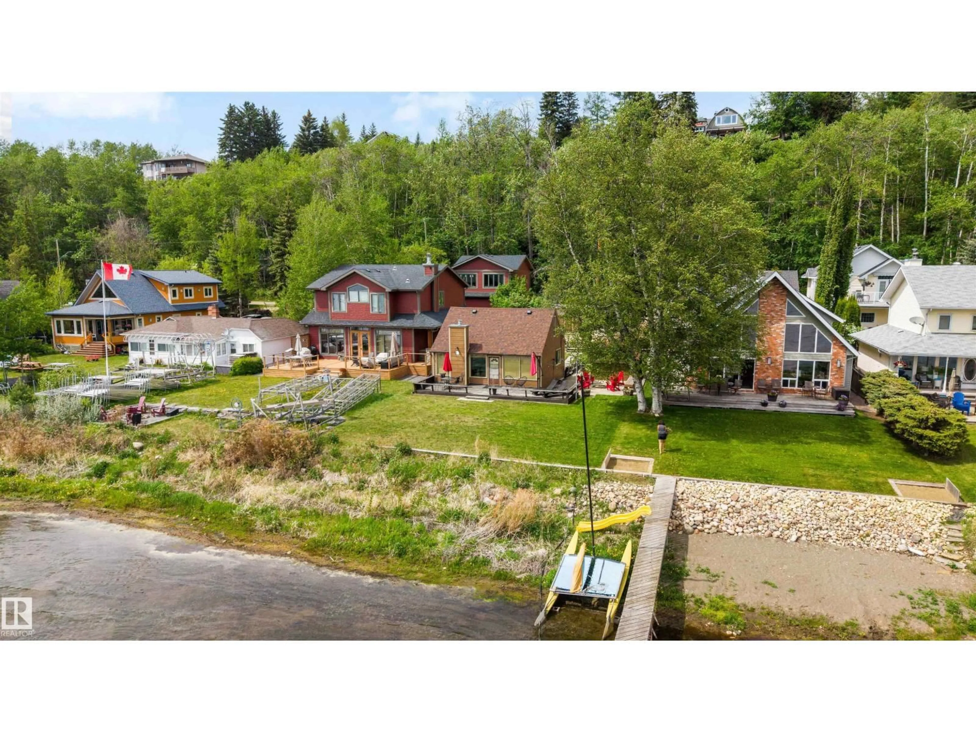 A pic from outside/outdoor area/front of a property/back of a property/a pic from drone, mountain view for 595 1 AV, Rural Parkland County Alberta T0E2B0
