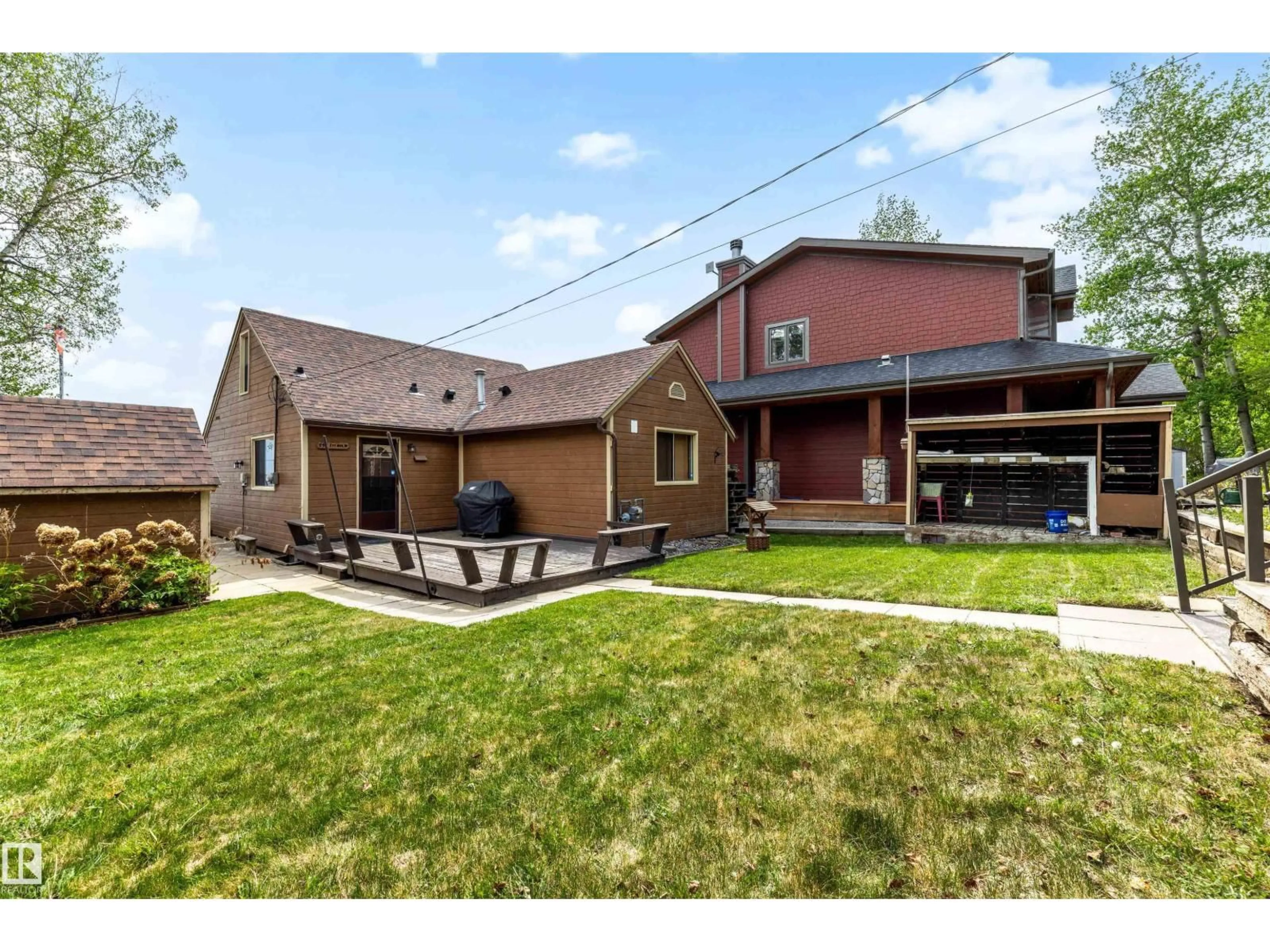 Home with brick exterior material, street for 595 1 AV, Rural Parkland County Alberta T0E2B0