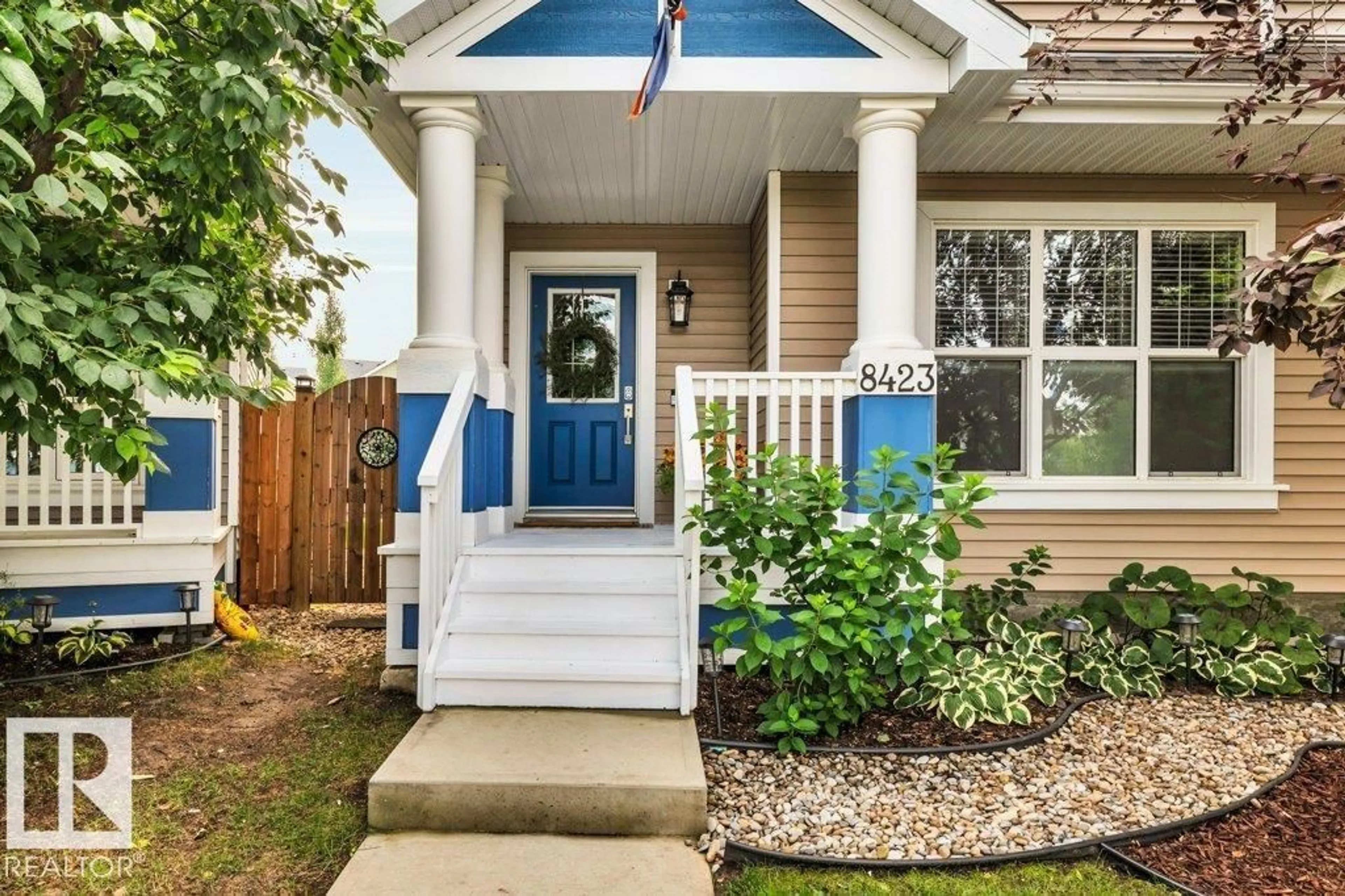 Home with vinyl exterior material, street for SW SW - 8423 23 AV, Edmonton Alberta T6X2G1