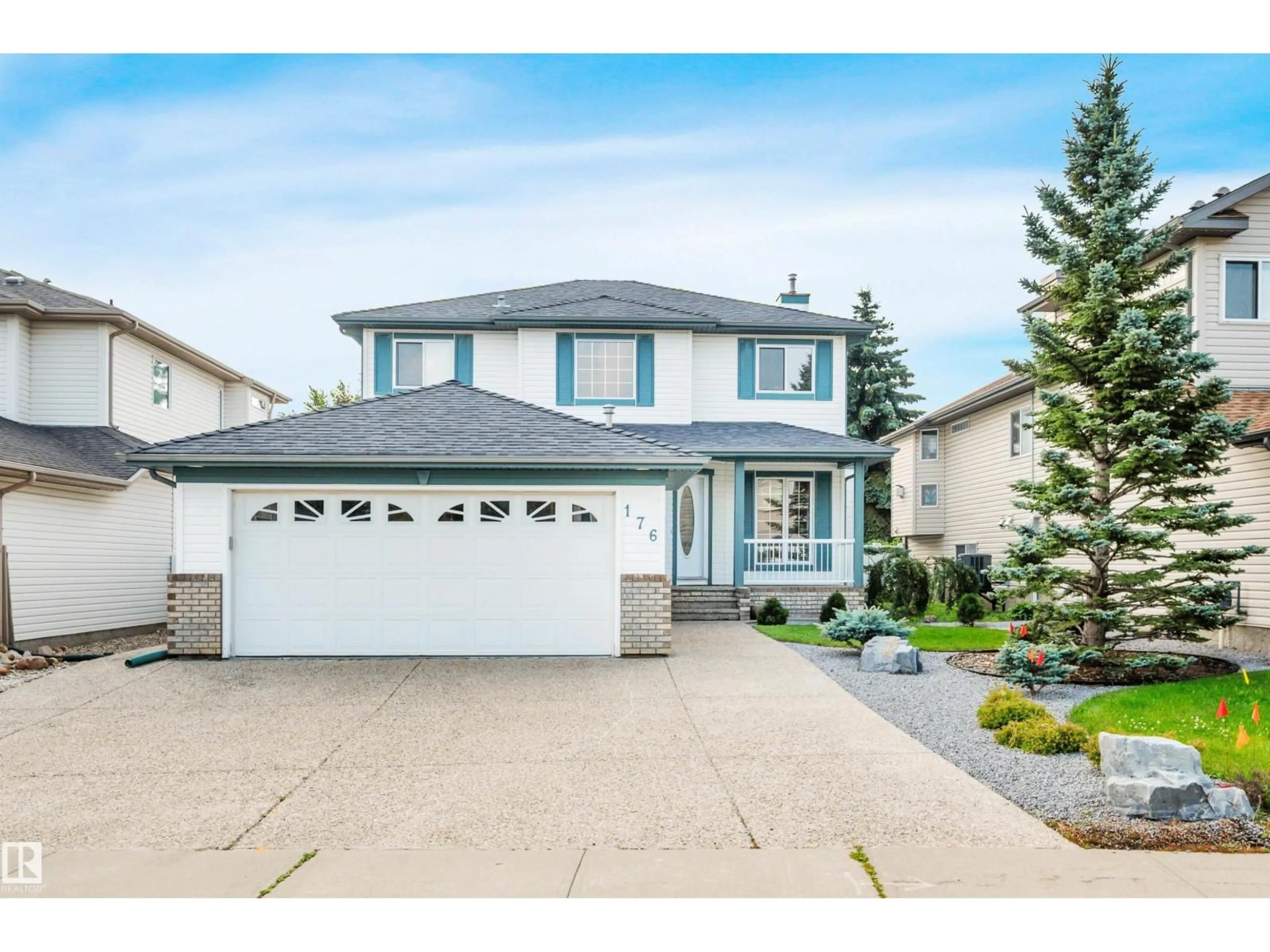 Home with vinyl exterior material, street for 176 FORREST DR, Sherwood Park Alberta T8A6A8