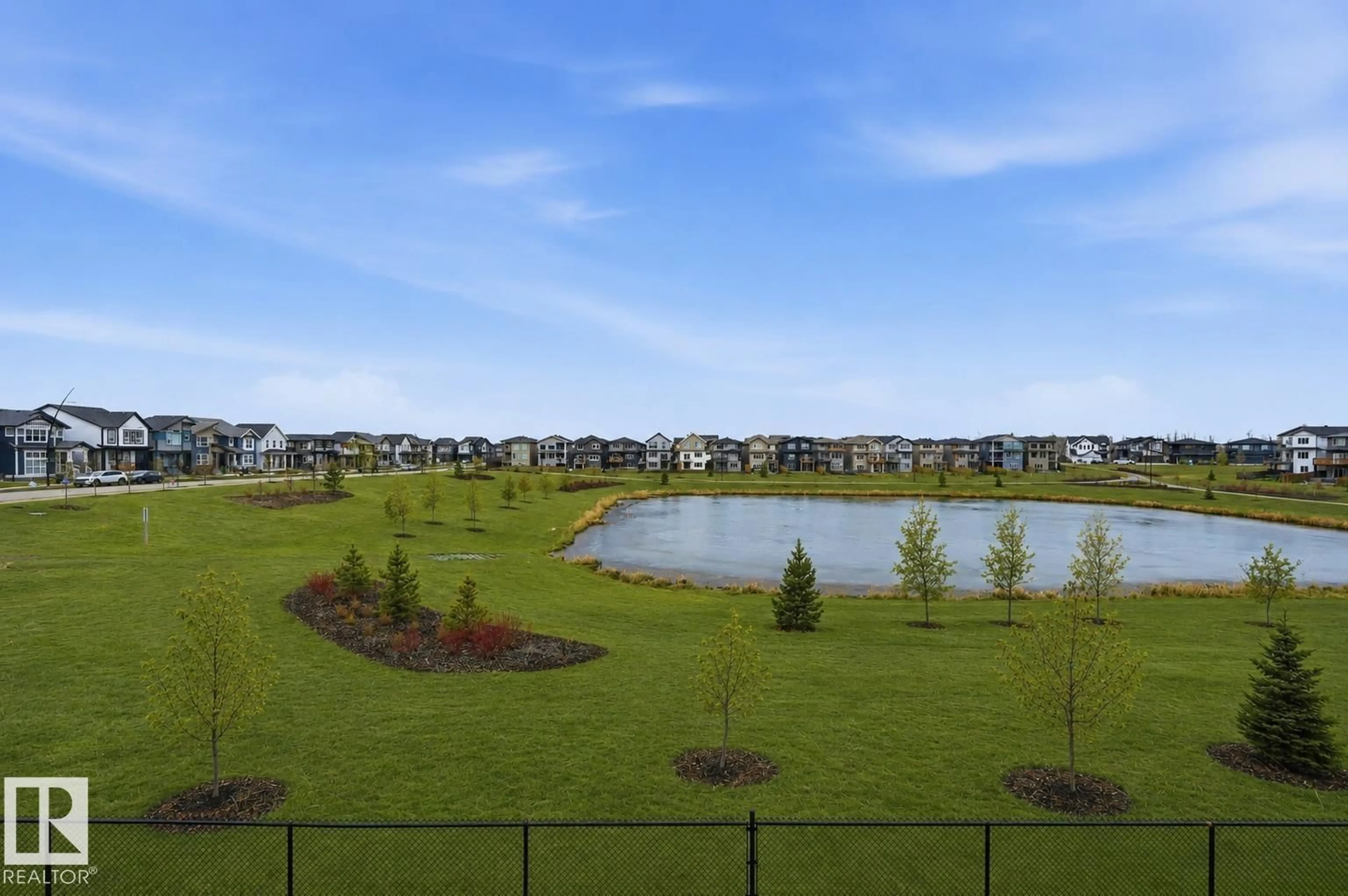 A pic from outside/outdoor area/front of a property/back of a property/a pic from drone, water/lake/river/ocean view for NW - 2520 206 ST, Edmonton Alberta T6M1P1