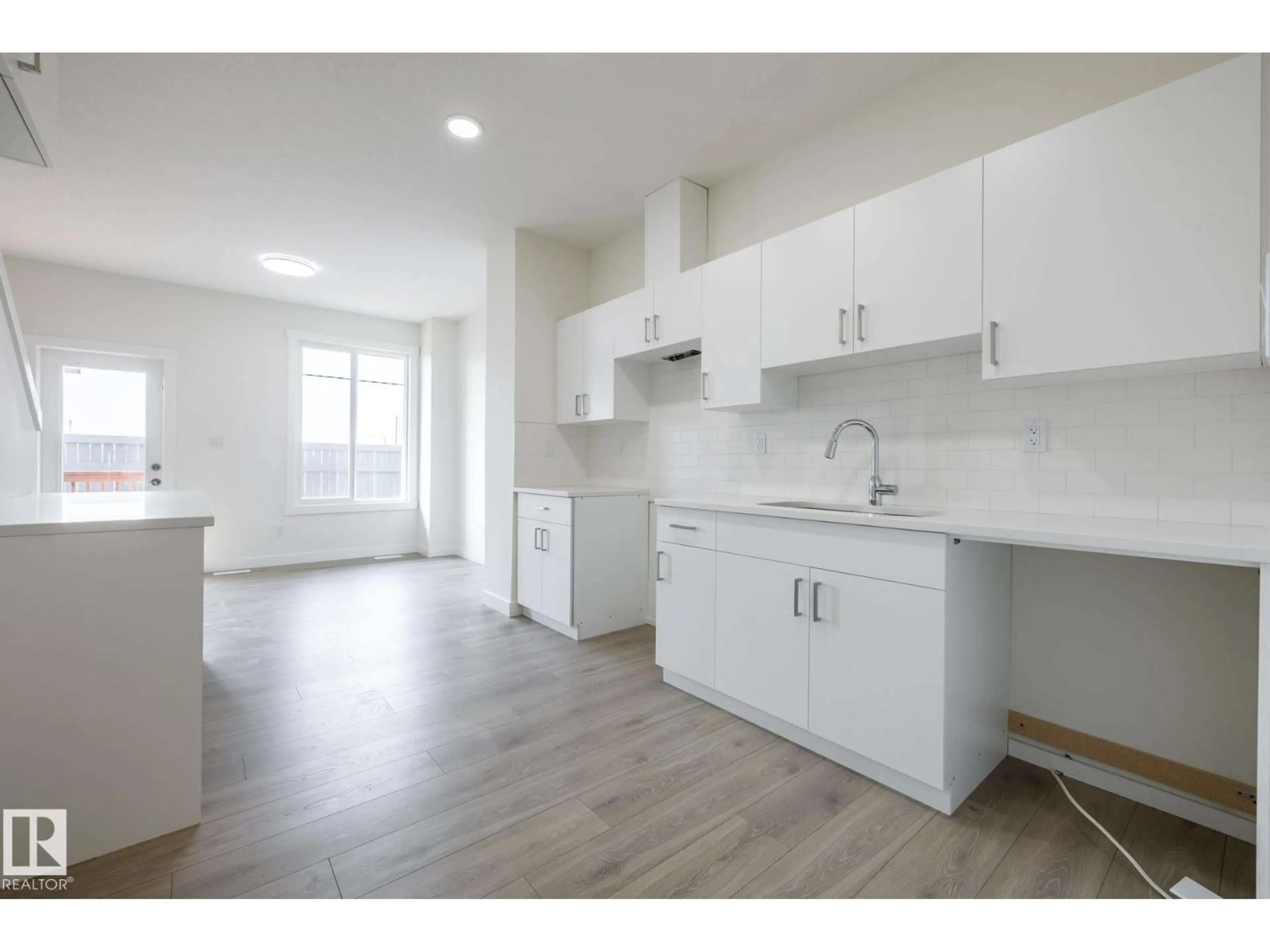 Open concept kitchen, unknown for #24 - 7020 KESWICK CM, Edmonton Alberta T6W5P8