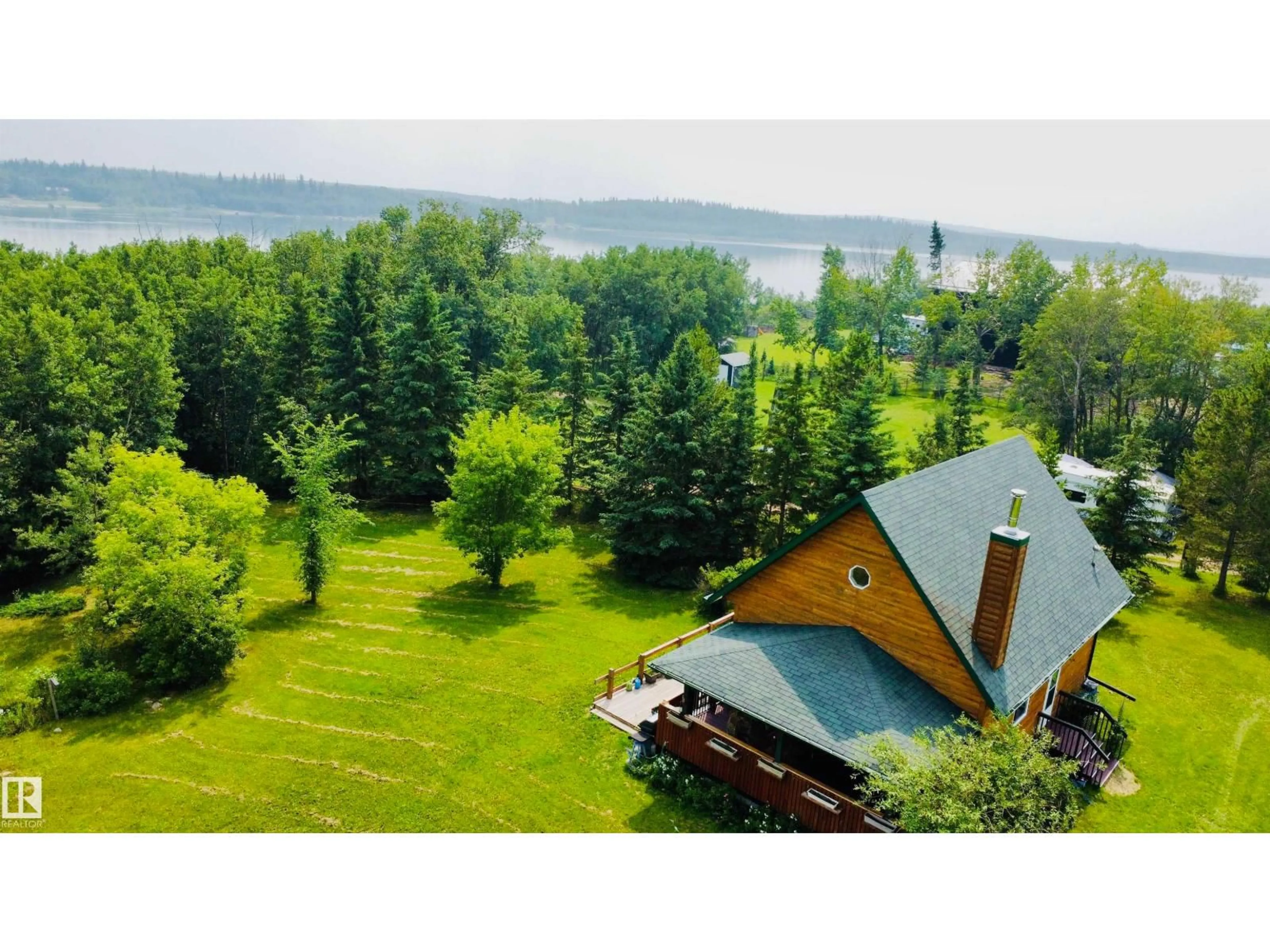A pic from outside/outdoor area/front of a property/back of a property/a pic from drone, water/lake/river/ocean view for 111 - 119 RNG RD, Rural St. Paul County Alberta T0A3A0