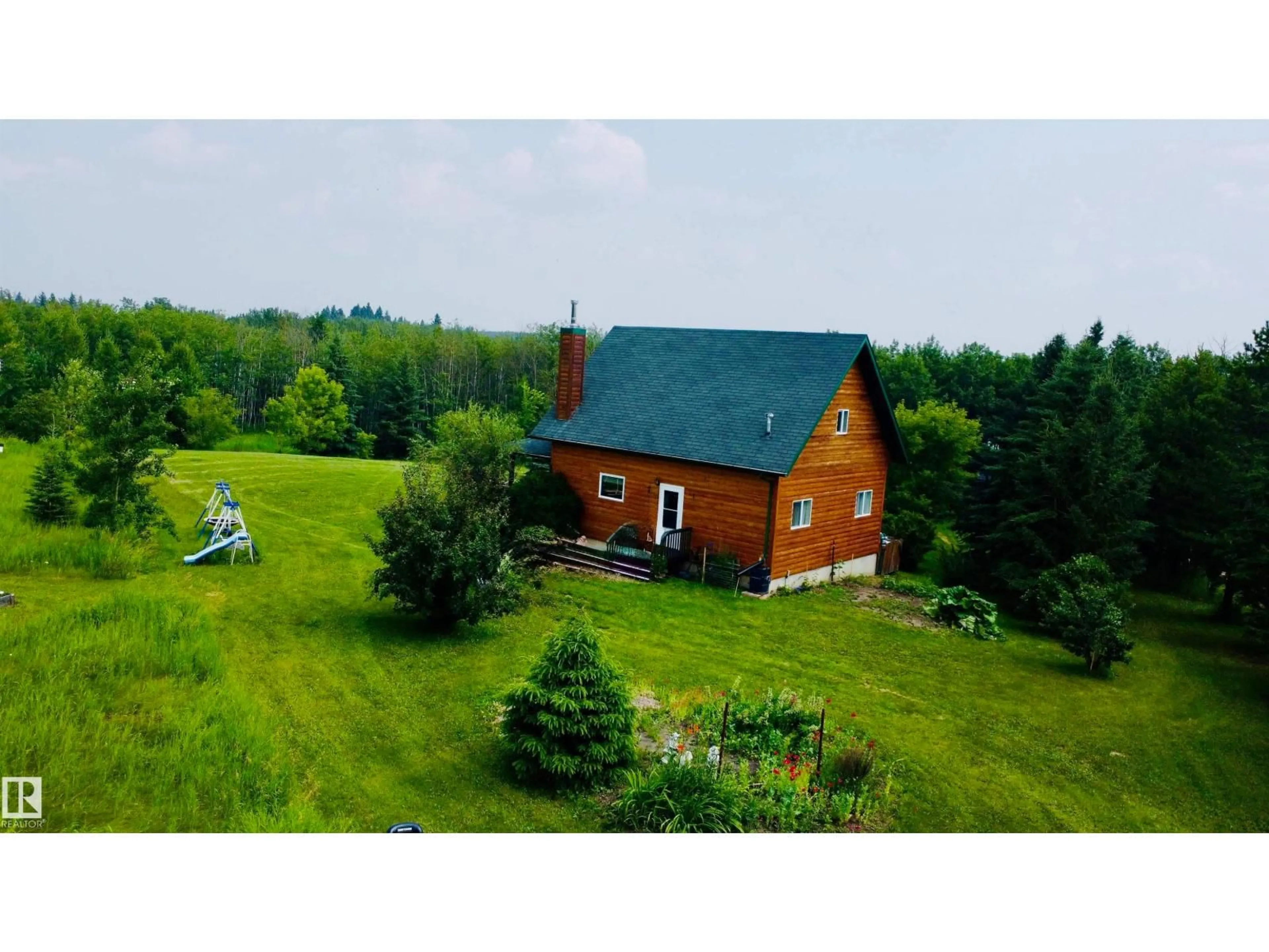 A pic from outside/outdoor area/front of a property/back of a property/a pic from drone, unknown for 111 - 119 RNG RD, Rural St. Paul County Alberta T0A3A0