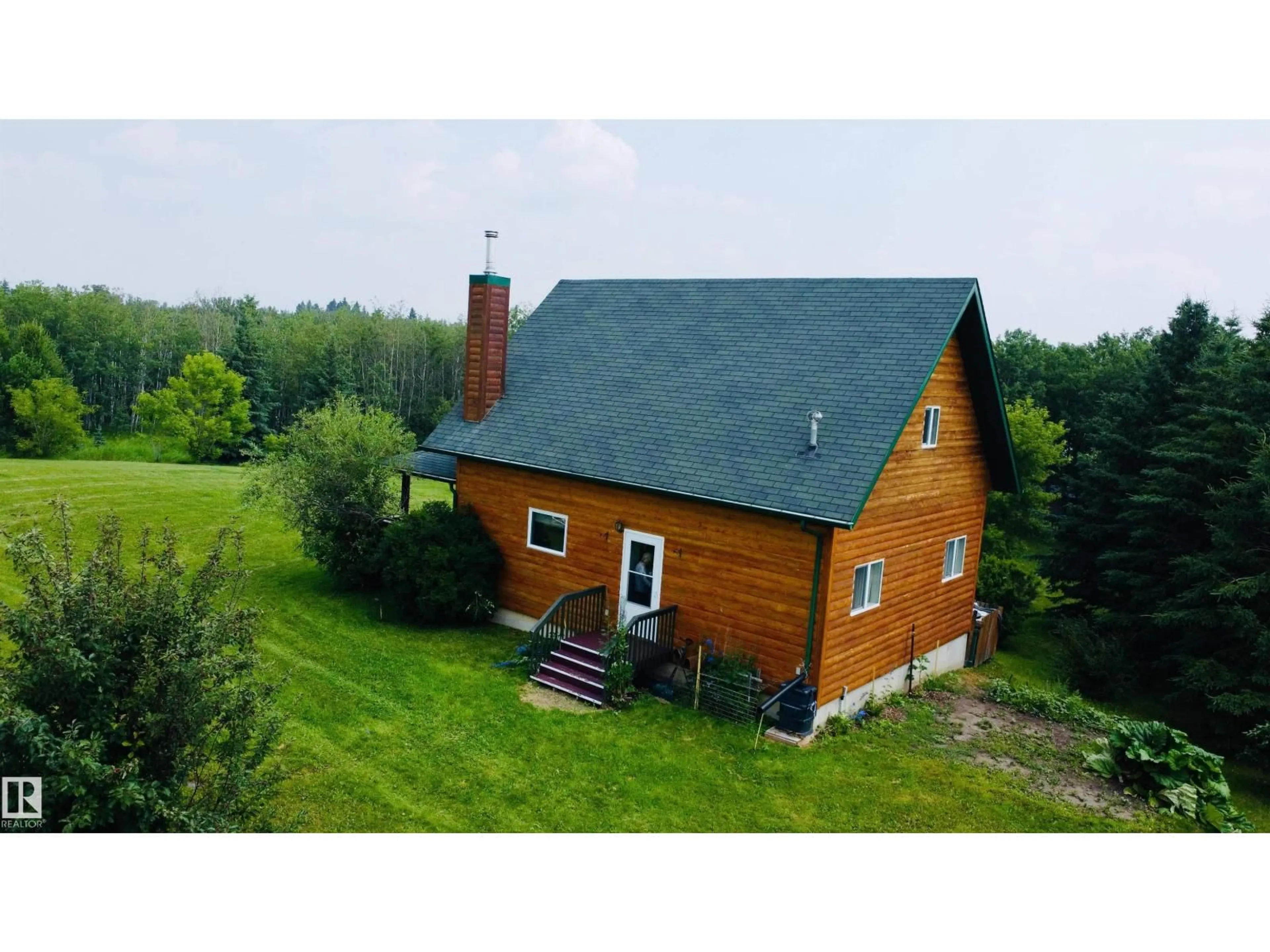 A pic from outside/outdoor area/front of a property/back of a property/a pic from drone, building for 111 - 119 RNG RD, Rural St. Paul County Alberta T0A3A0