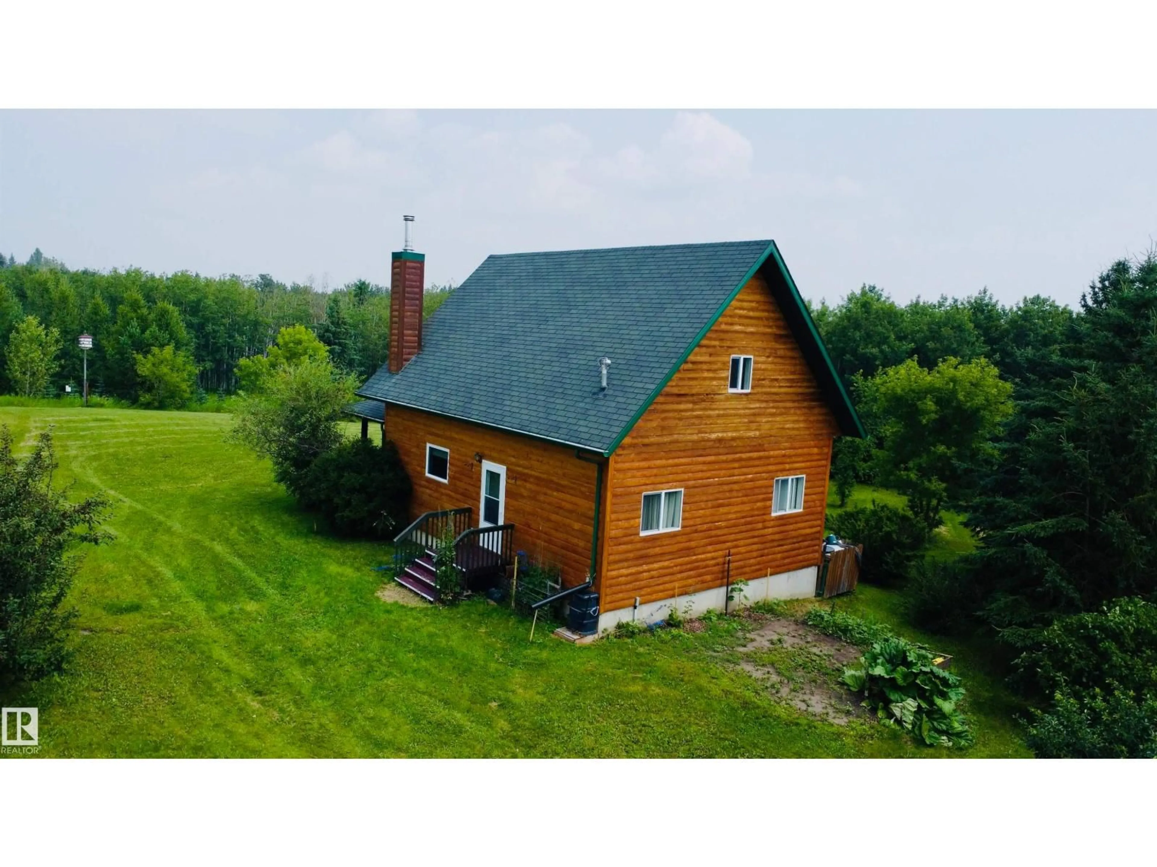 A pic from outside/outdoor area/front of a property/back of a property/a pic from drone, building for 111 - 119 RNG RD, Rural St. Paul County Alberta T0A3A0