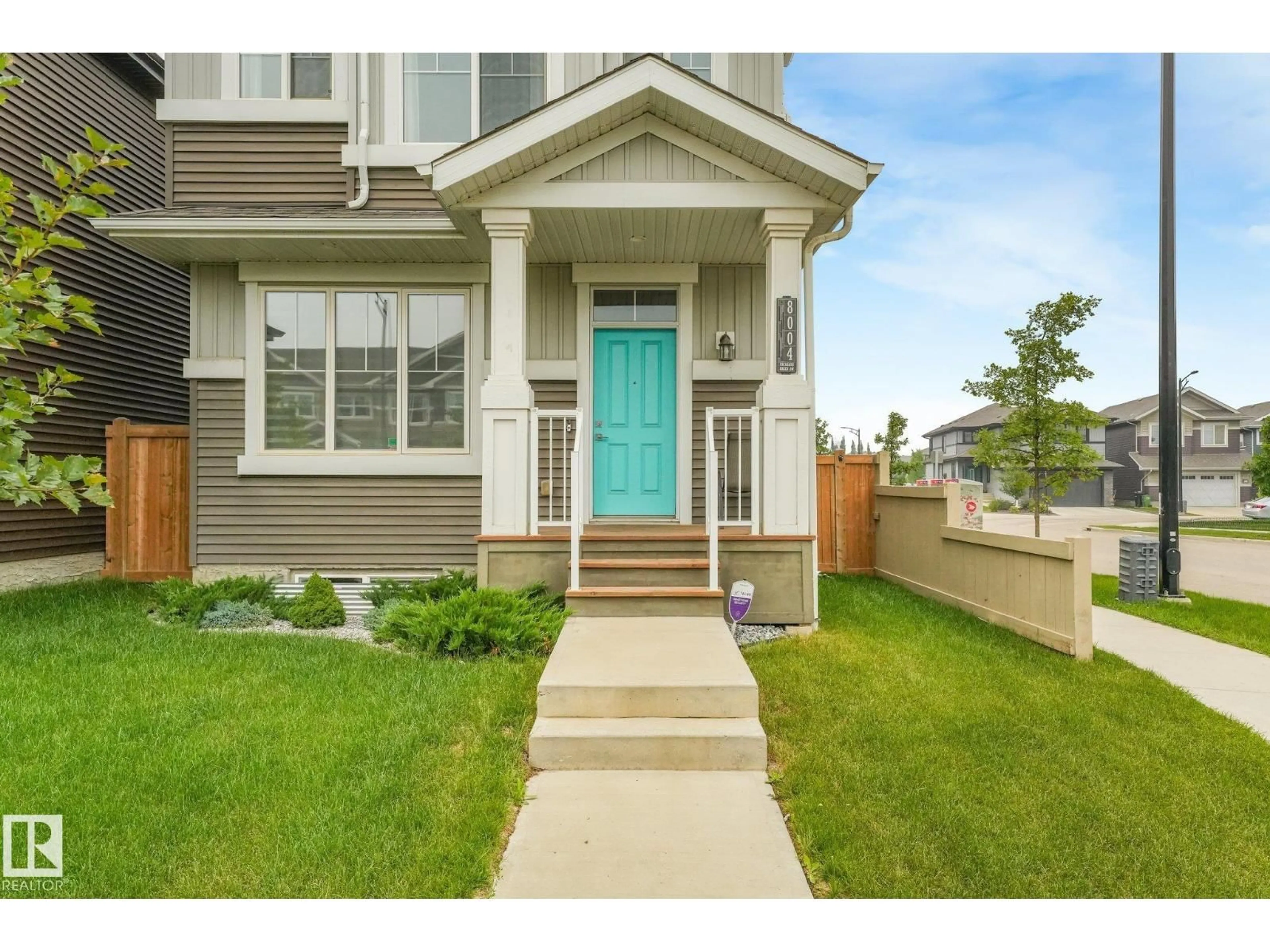 Home with vinyl exterior material, street for SW - 8004 ORCHARDS GREEN GR, Edmonton Alberta T6X2L5