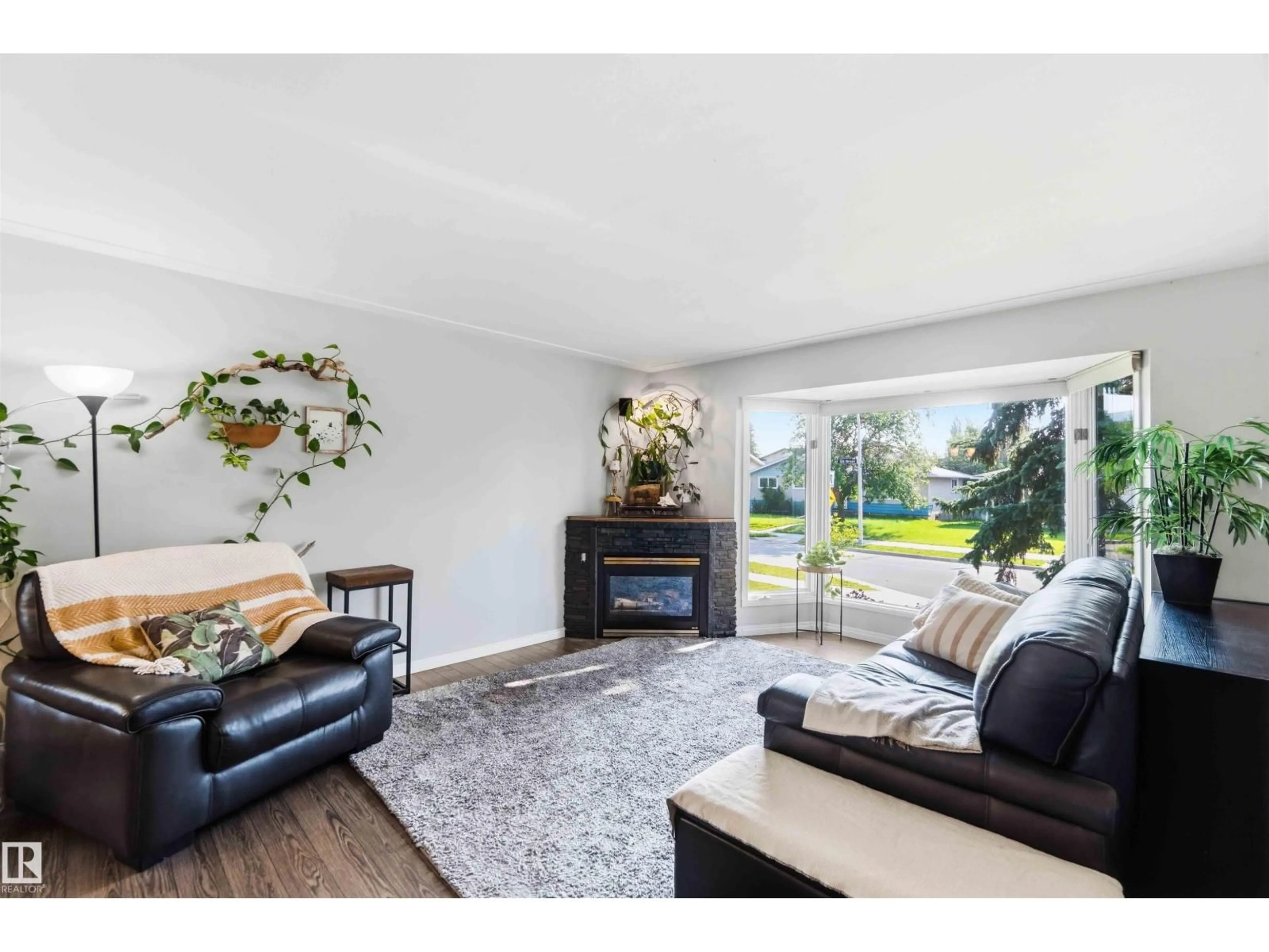 Living room with furniture, unknown for 5208 105 ST, Edmonton Alberta T6H2M8