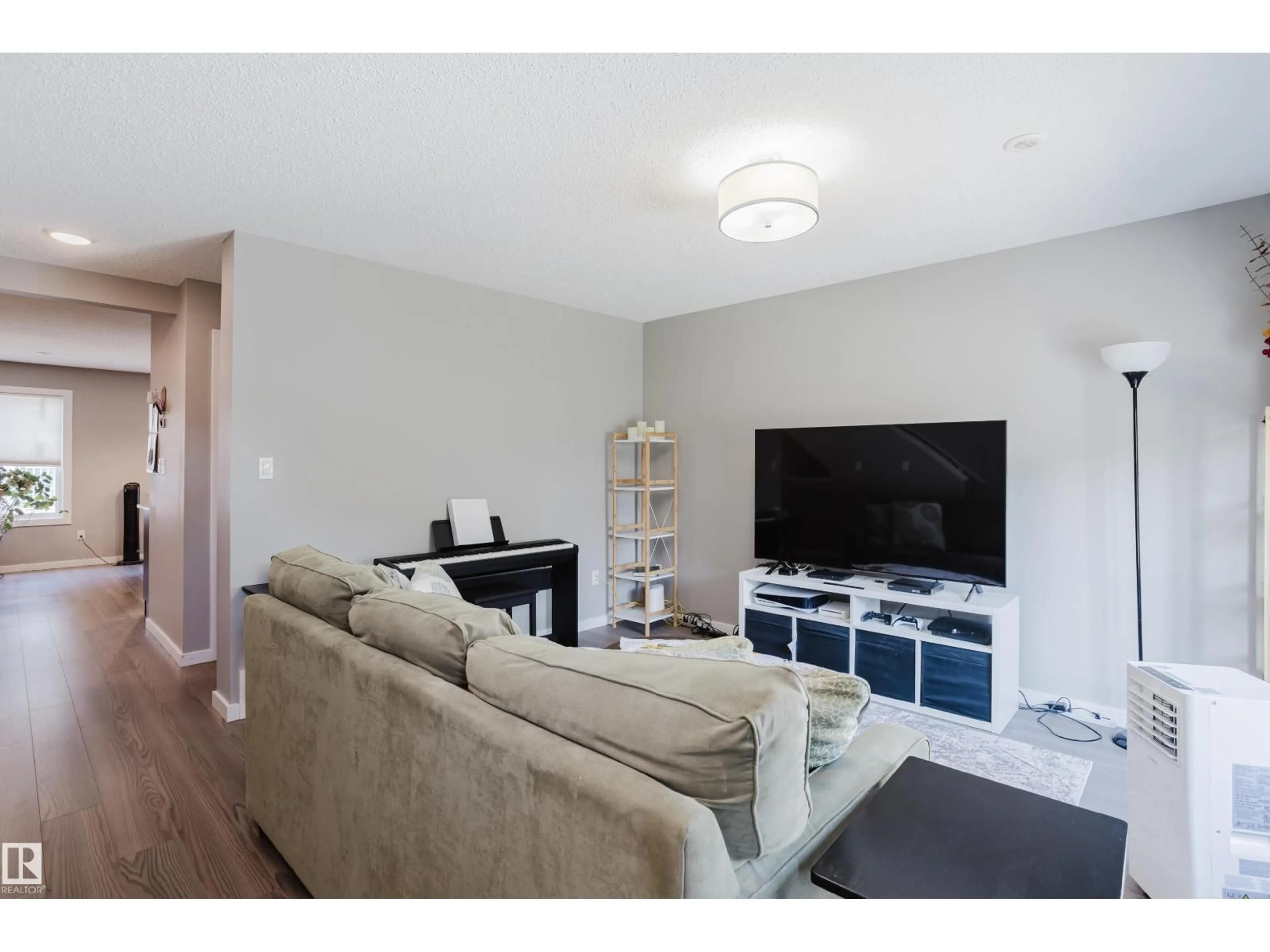 Living room with furniture, unknown for #28 - 2215 24 ST, Edmonton Alberta T6T1A6