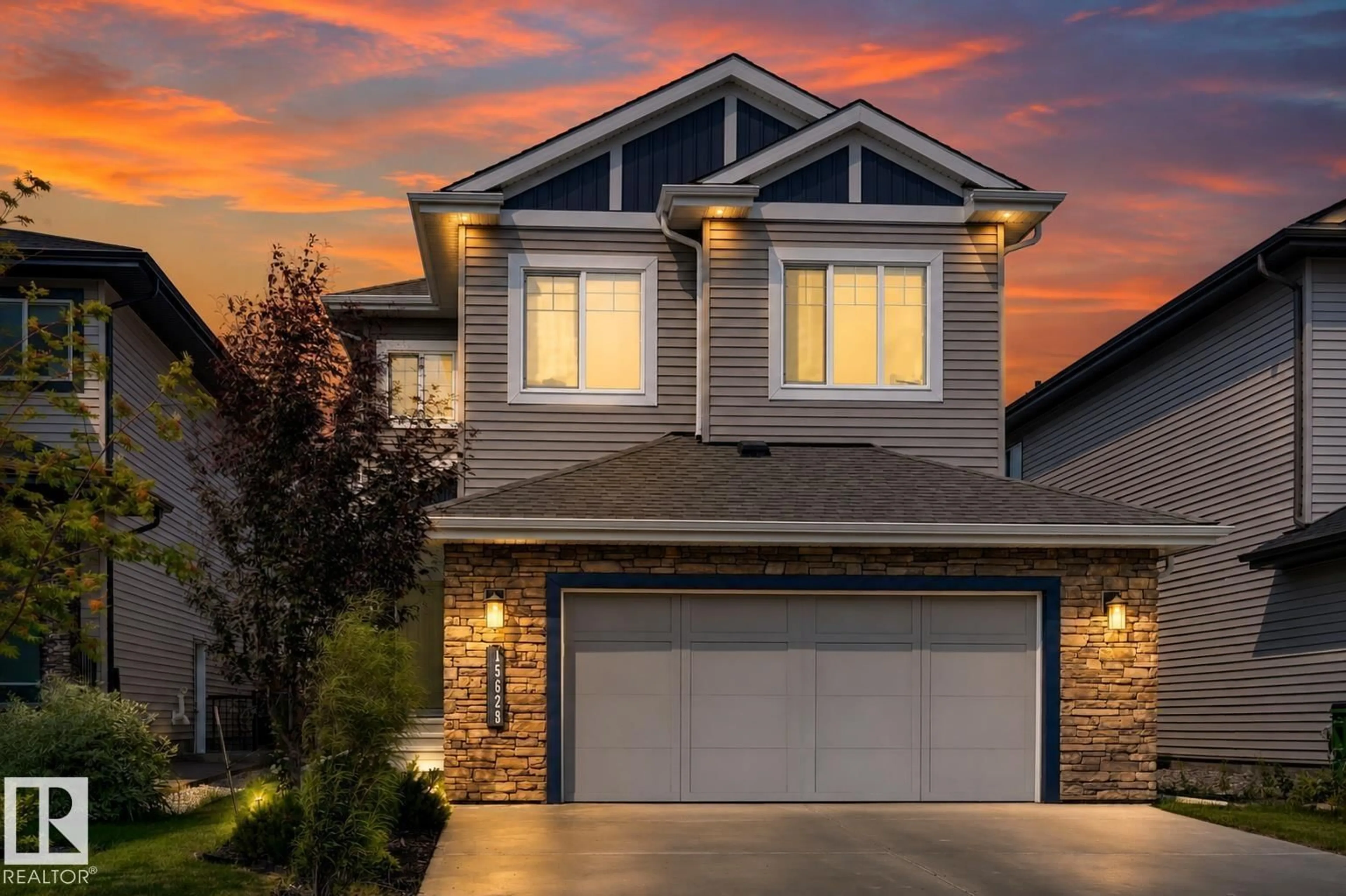 Home with vinyl exterior material, street for SW - 15628 15 AV, Edmonton Alberta T6W4K8