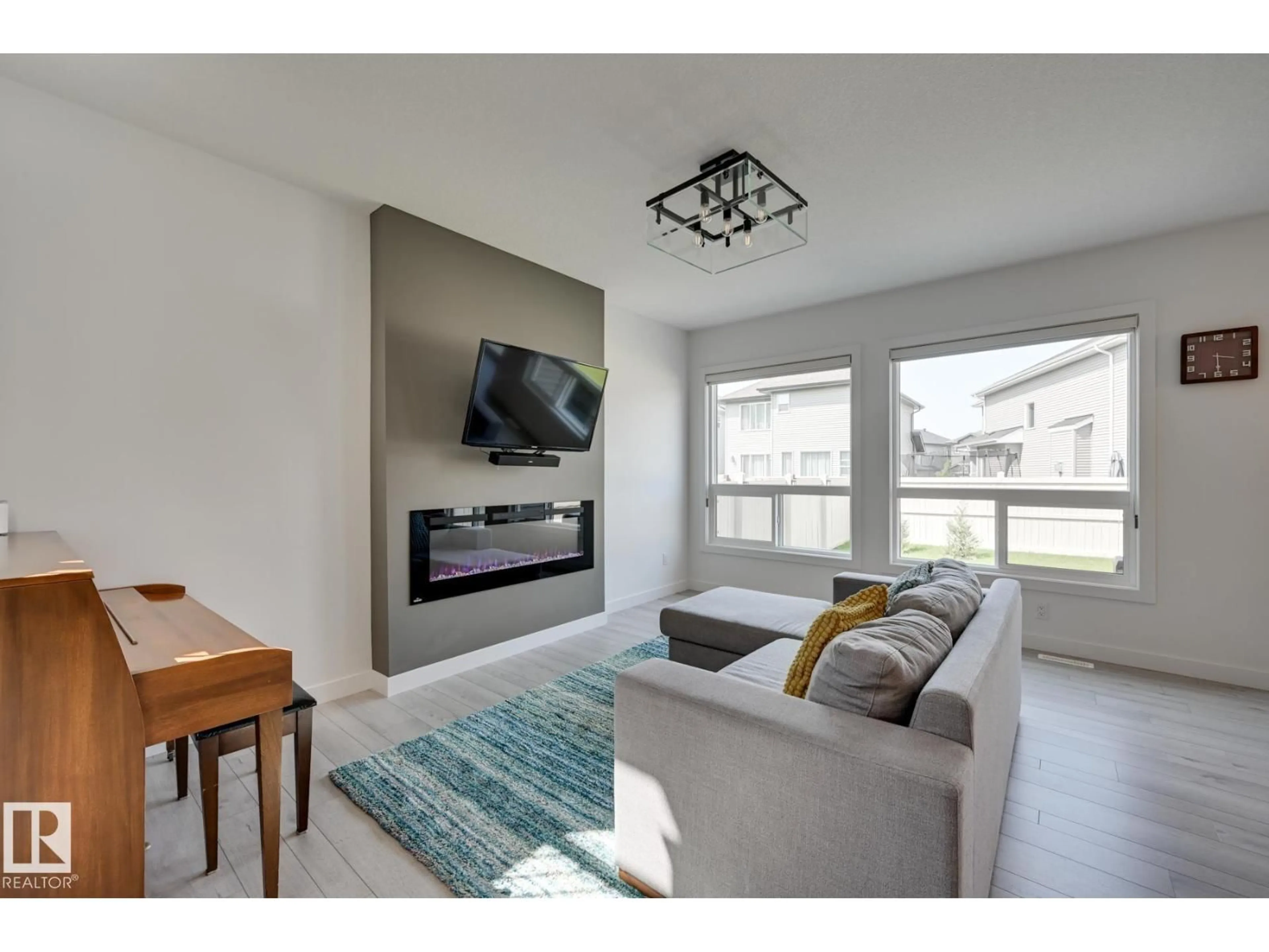 Living room with furniture, unknown for SW - 15628 15 AV, Edmonton Alberta T6W4K8