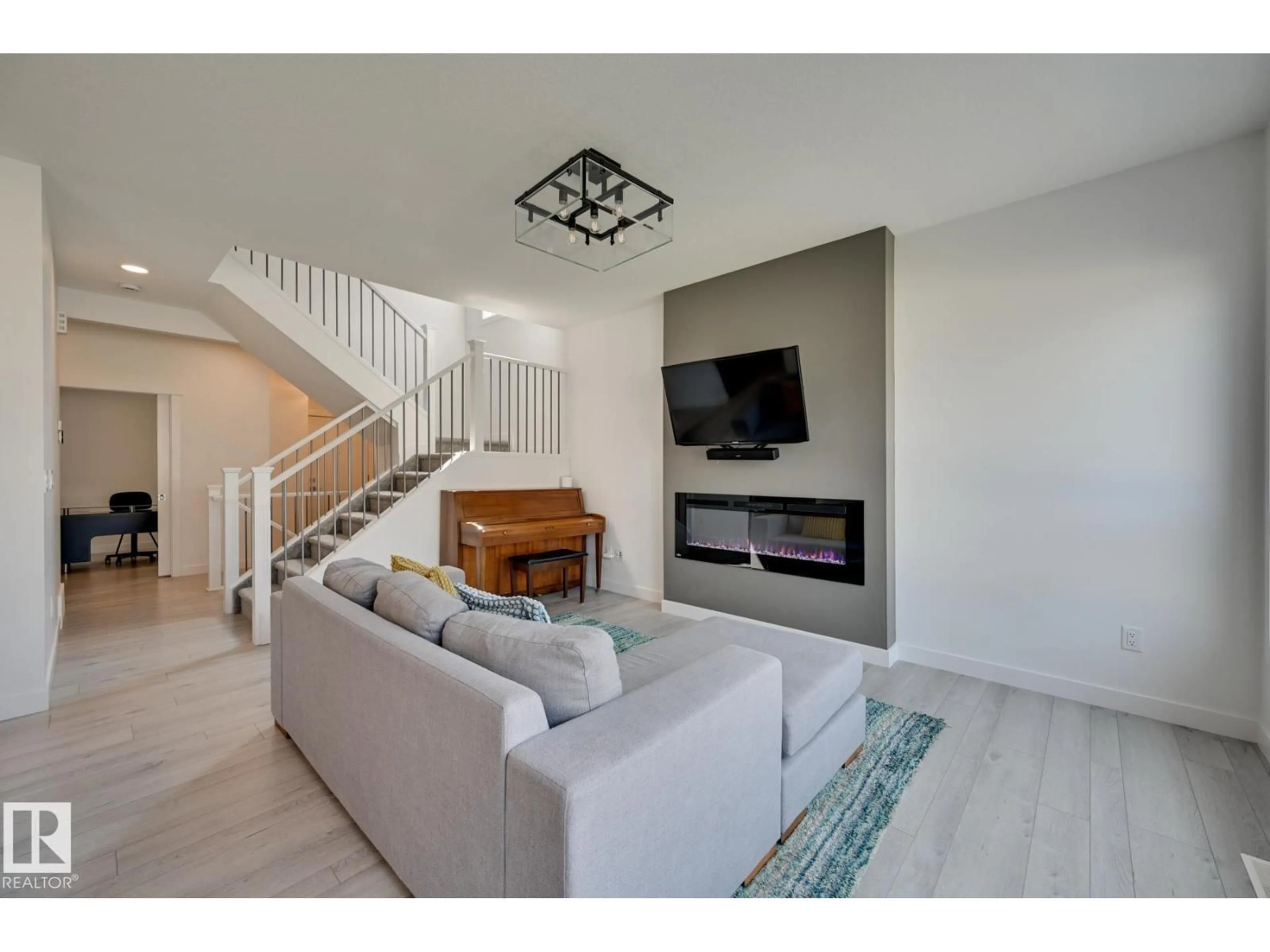 Living room with furniture, unknown for SW - 15628 15 AV, Edmonton Alberta T6W4K8