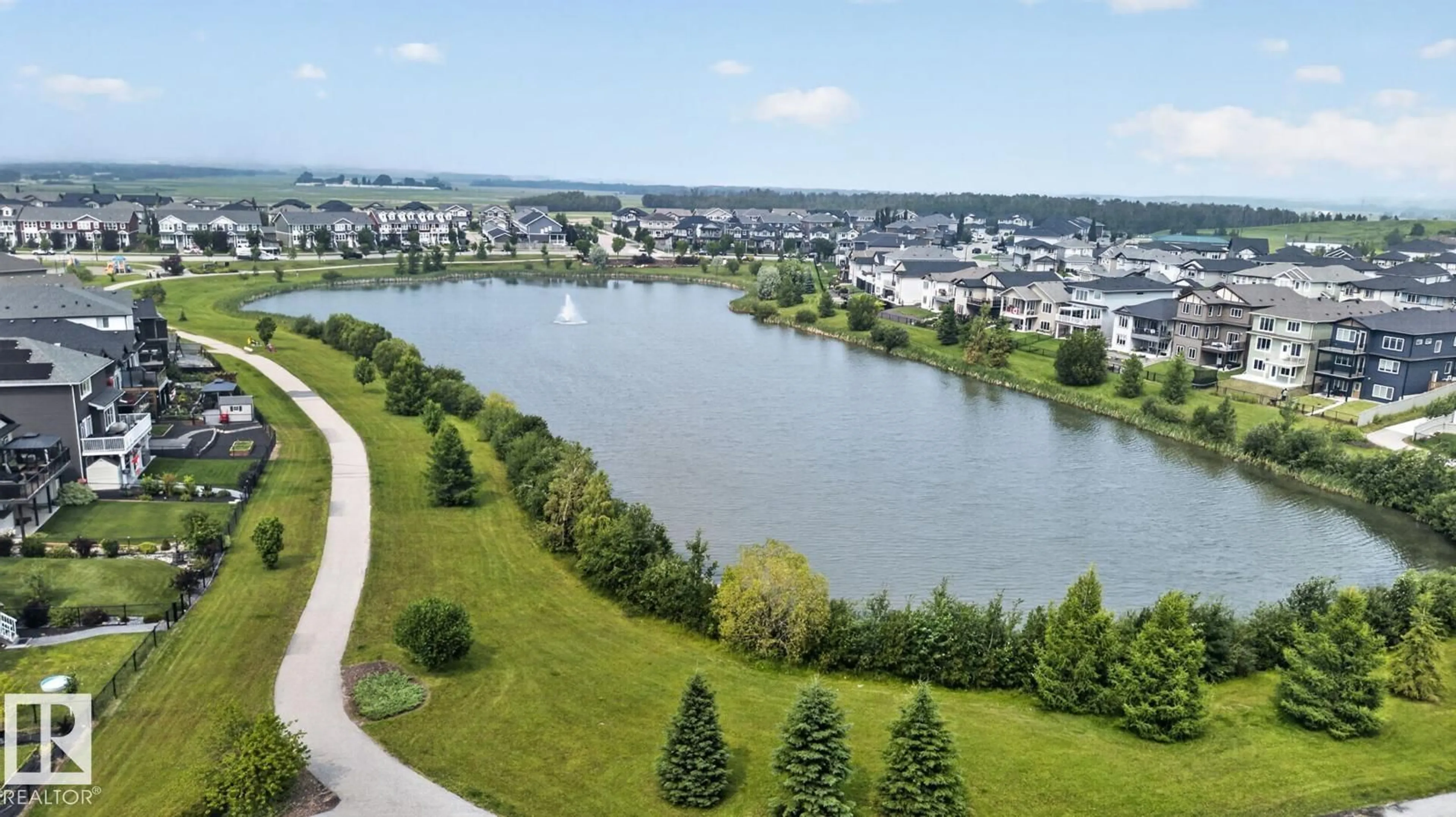 A pic from outside/outdoor area/front of a property/back of a property/a pic from drone, water/lake/river/ocean view for 450 ROBINSON BLVD, Leduc Alberta T9E1P8