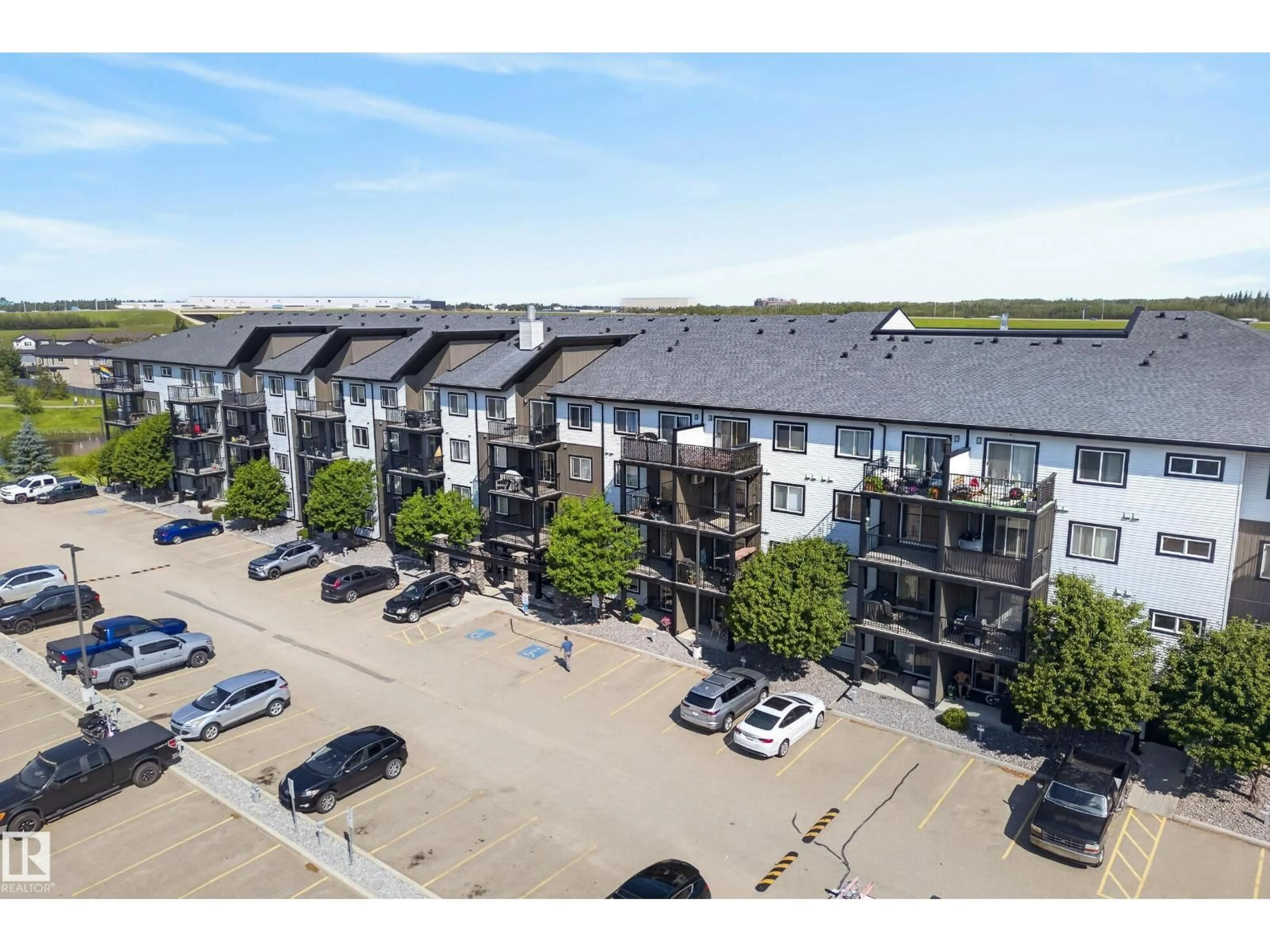 A pic from outside/outdoor area/front of a property/back of a property/a pic from drone, unknown for #319 - 508 ALBANY WY, Edmonton Alberta T6V0L1