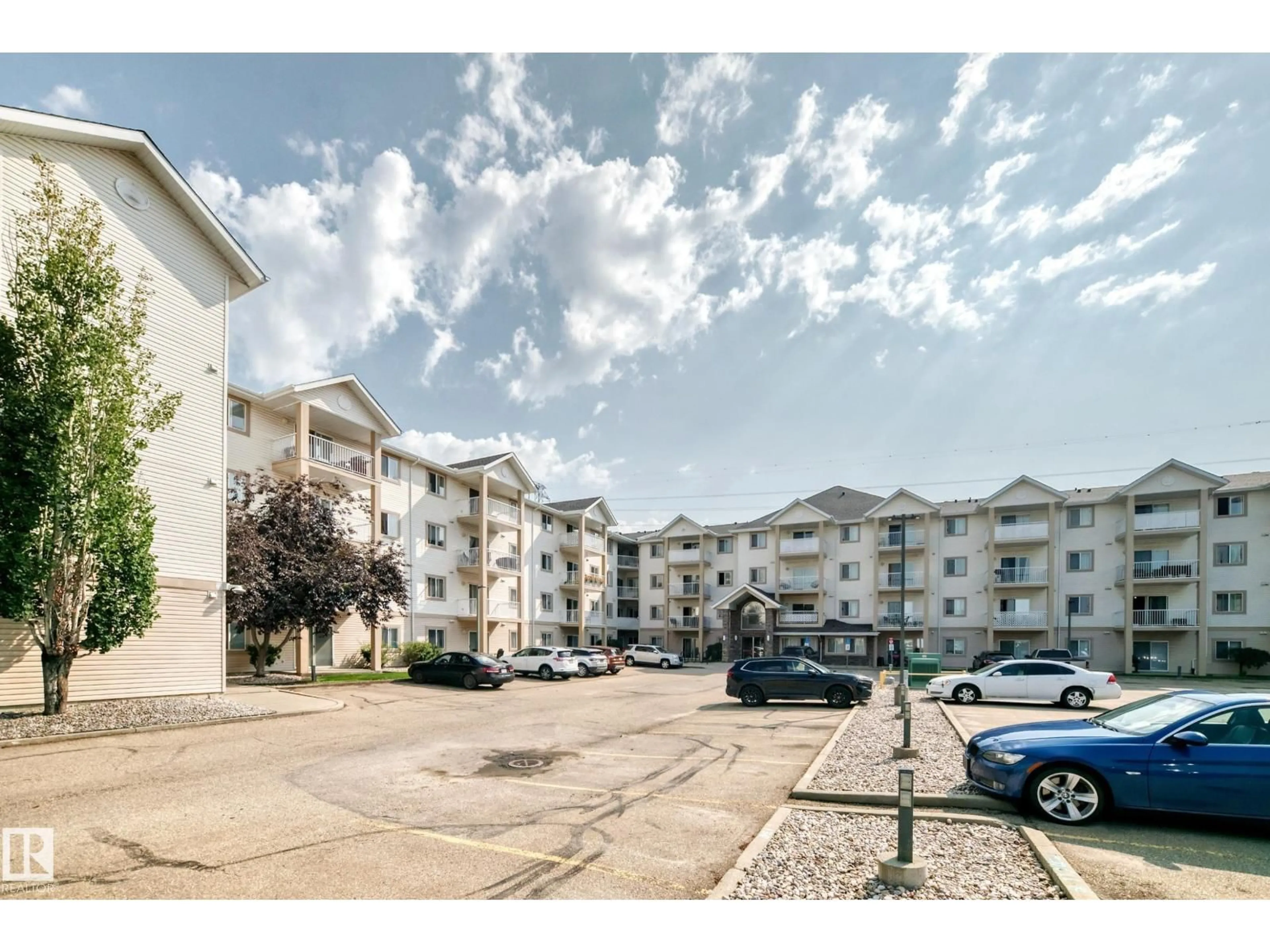 A pic from outside/outdoor area/front of a property/back of a property/a pic from drone, unknown for #214 - 245 EDWARDS DR, Edmonton Alberta T6X1J9