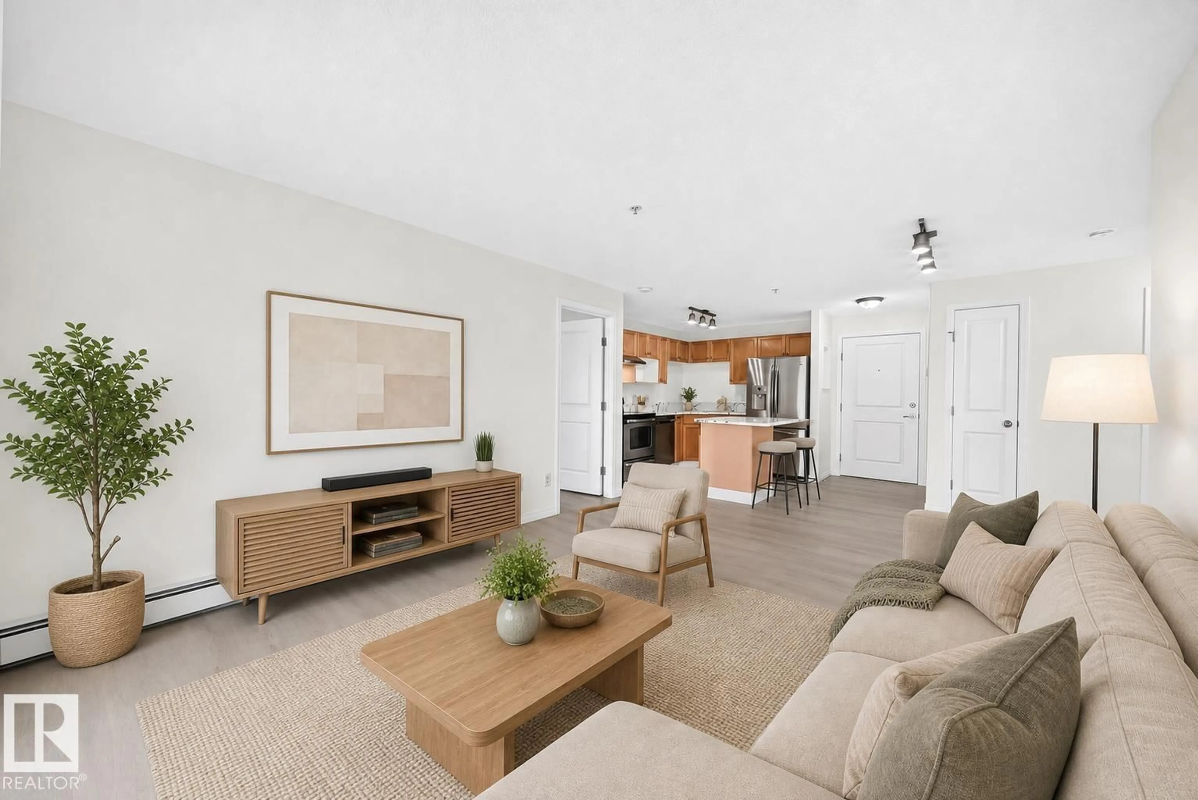 Living room with furniture, unknown for #214 - 245 EDWARDS DR, Edmonton Alberta T6X1J9