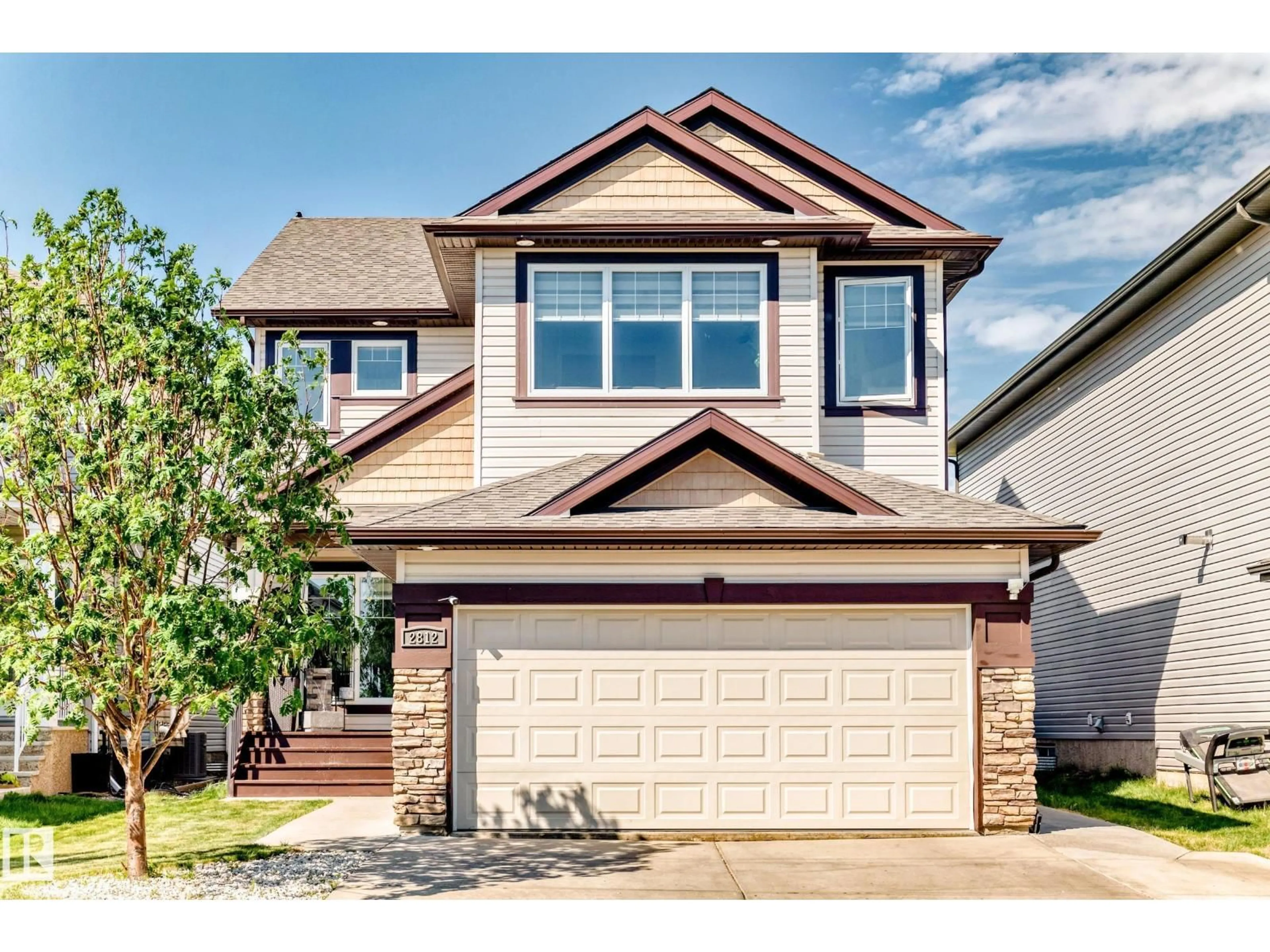 Home with vinyl exterior material, street for 2812 12 ST, Edmonton Alberta T6T0V8