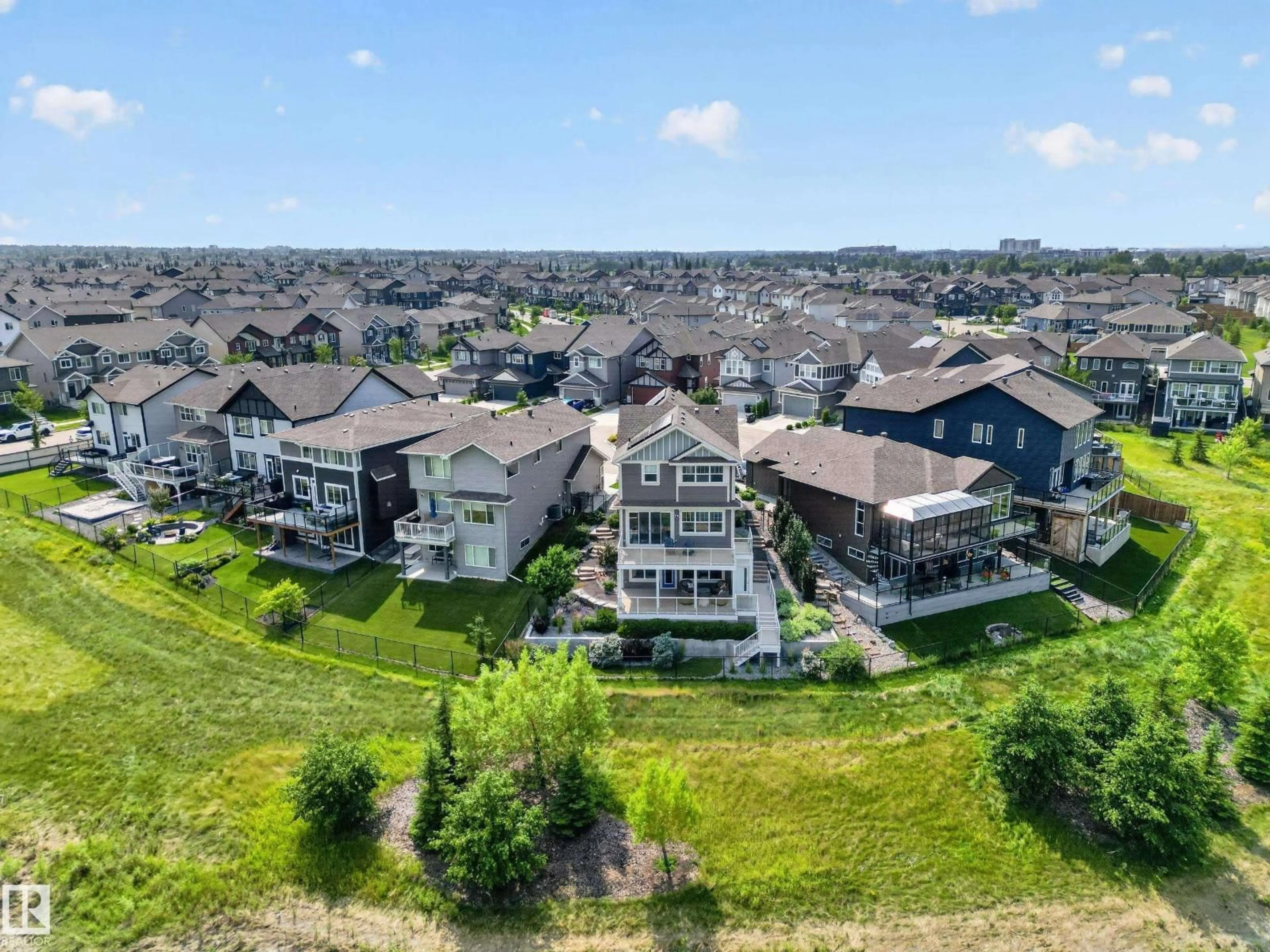 A pic from outside/outdoor area/front of a property/back of a property/a pic from drone, mountain view for 21 SAPPHIRE CV, Sherwood Park Alberta T8H1Z8