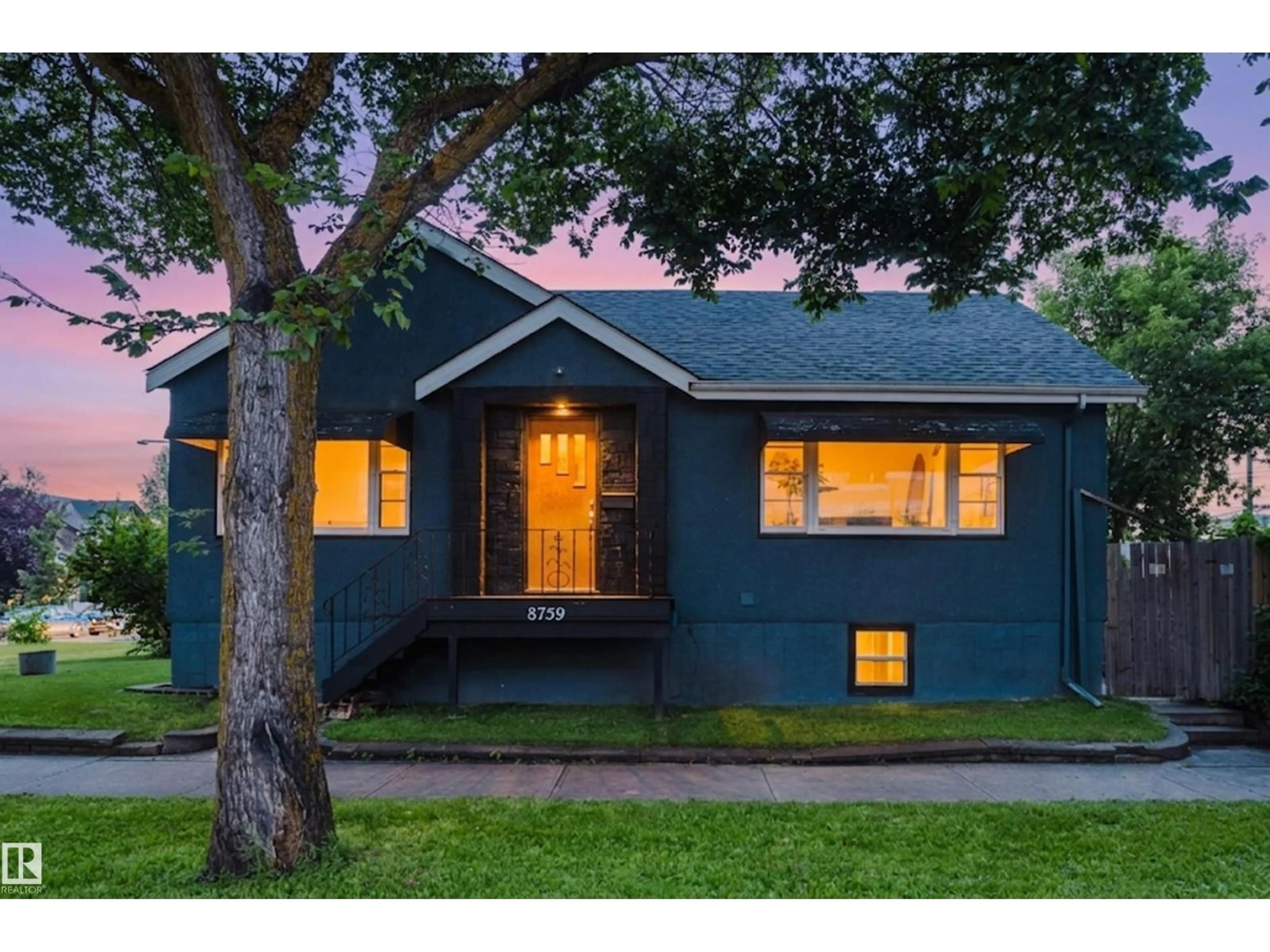 Home with vinyl exterior material, street for NW - 8759 78 AV, Edmonton Alberta T6C0N5