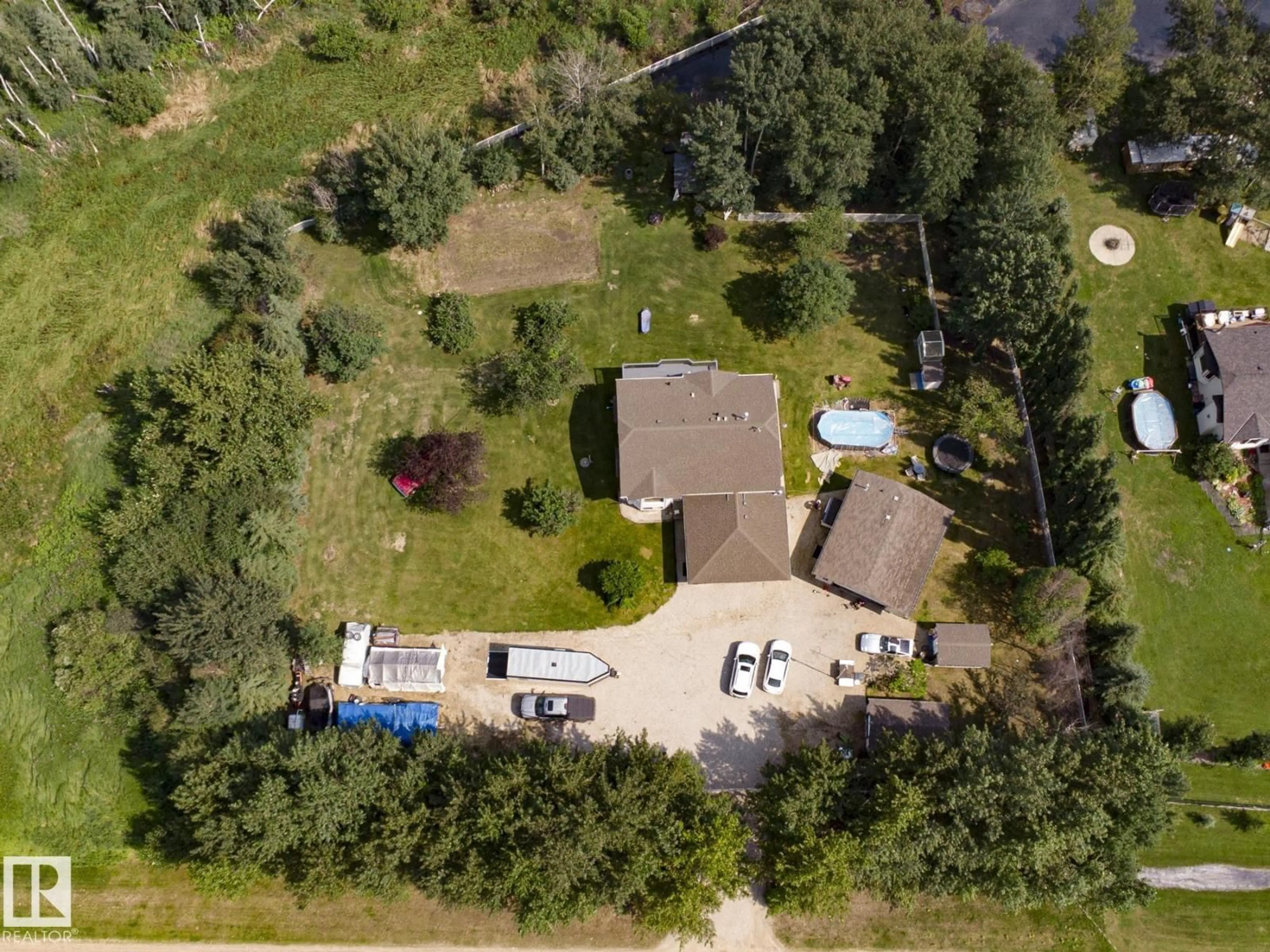 A pic from outside/outdoor area/front of a property/back of a property/a pic from drone, unknown for 61 52318 RGE ROAD 25, Rural Parkland County Alberta T7Y2M3
