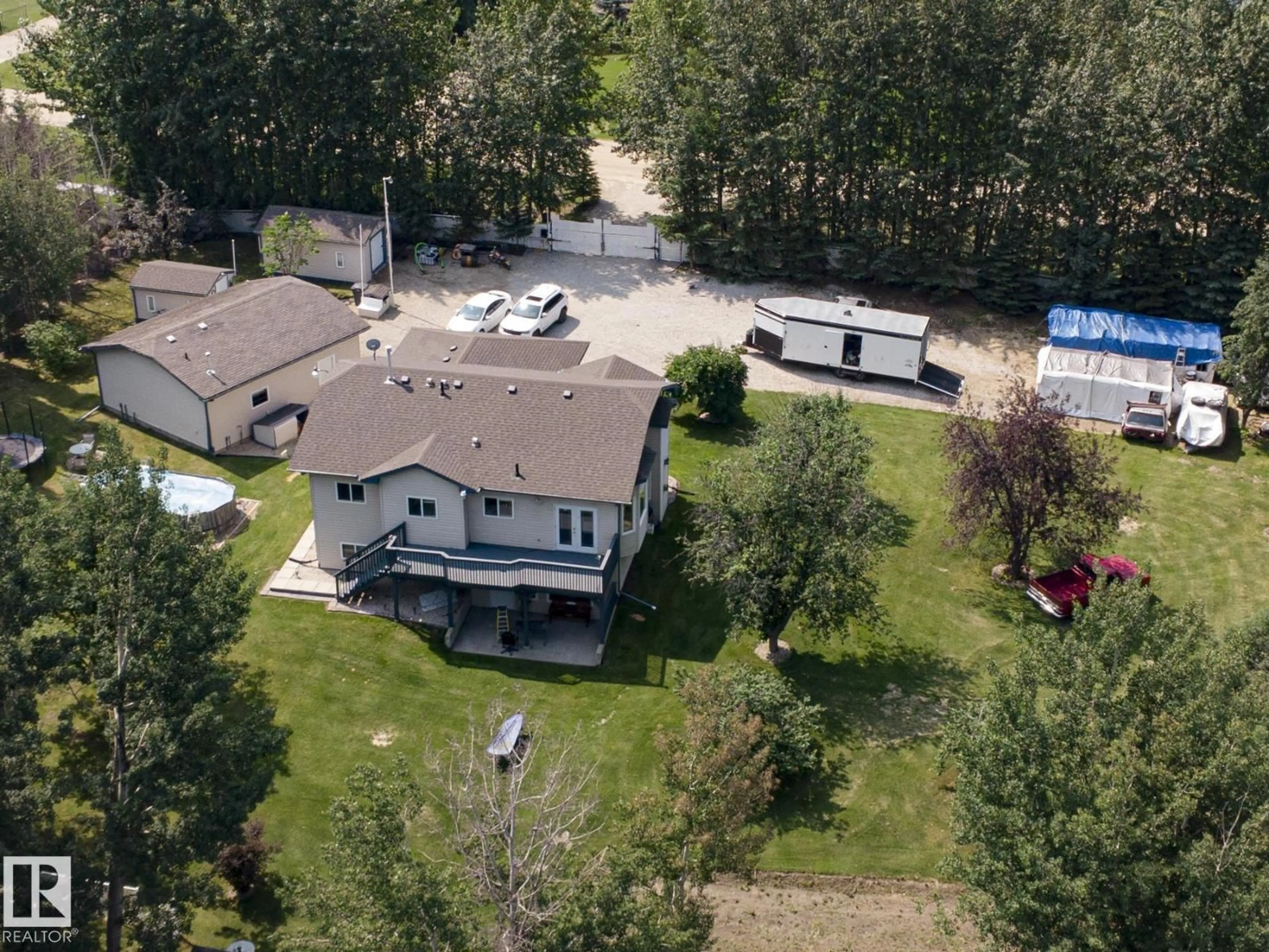 A pic from outside/outdoor area/front of a property/back of a property/a pic from drone, unknown for 61 52318 RGE ROAD 25, Rural Parkland County Alberta T7Y2M3