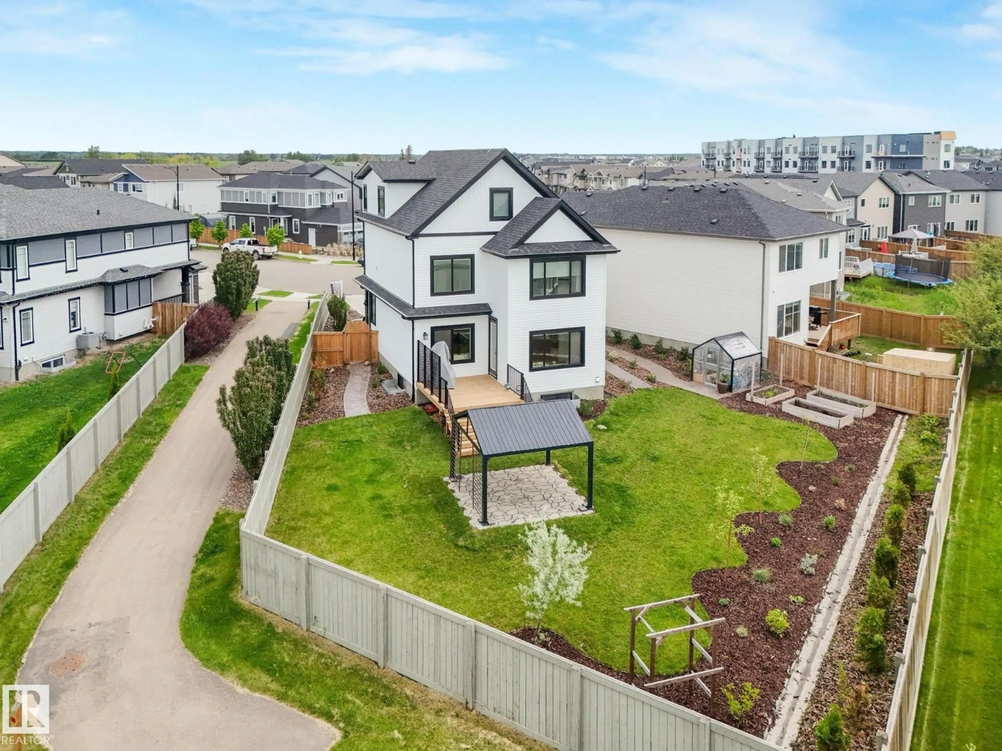 A pic from outside/outdoor area/front of a property/back of a property/a pic from drone, unknown for 6613 62 AV, Beaumont Alberta T4X0J3
