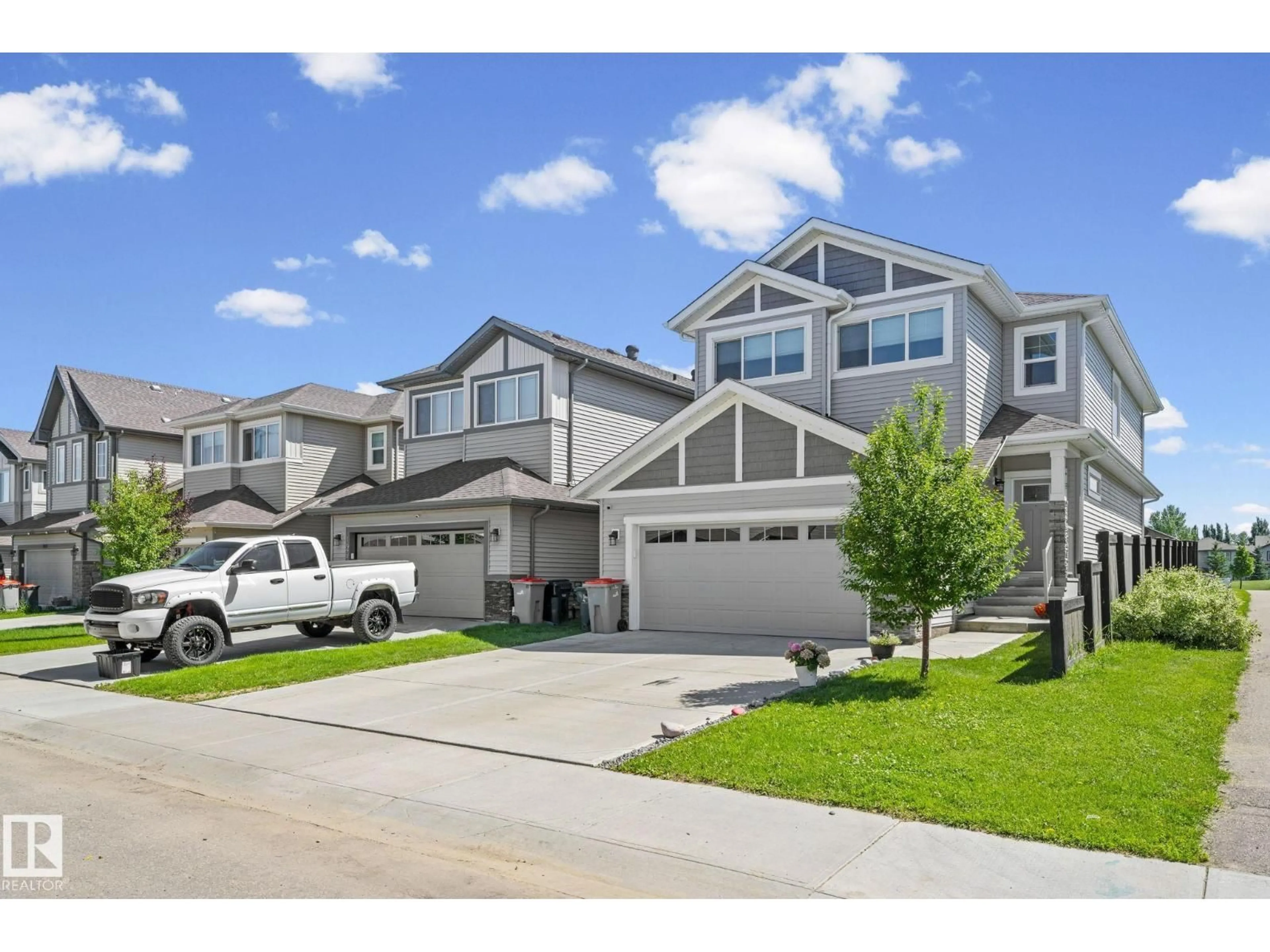 Home with vinyl exterior material, street for 1931 WESTERRA LN, Stony Plain Alberta T7Z0M9
