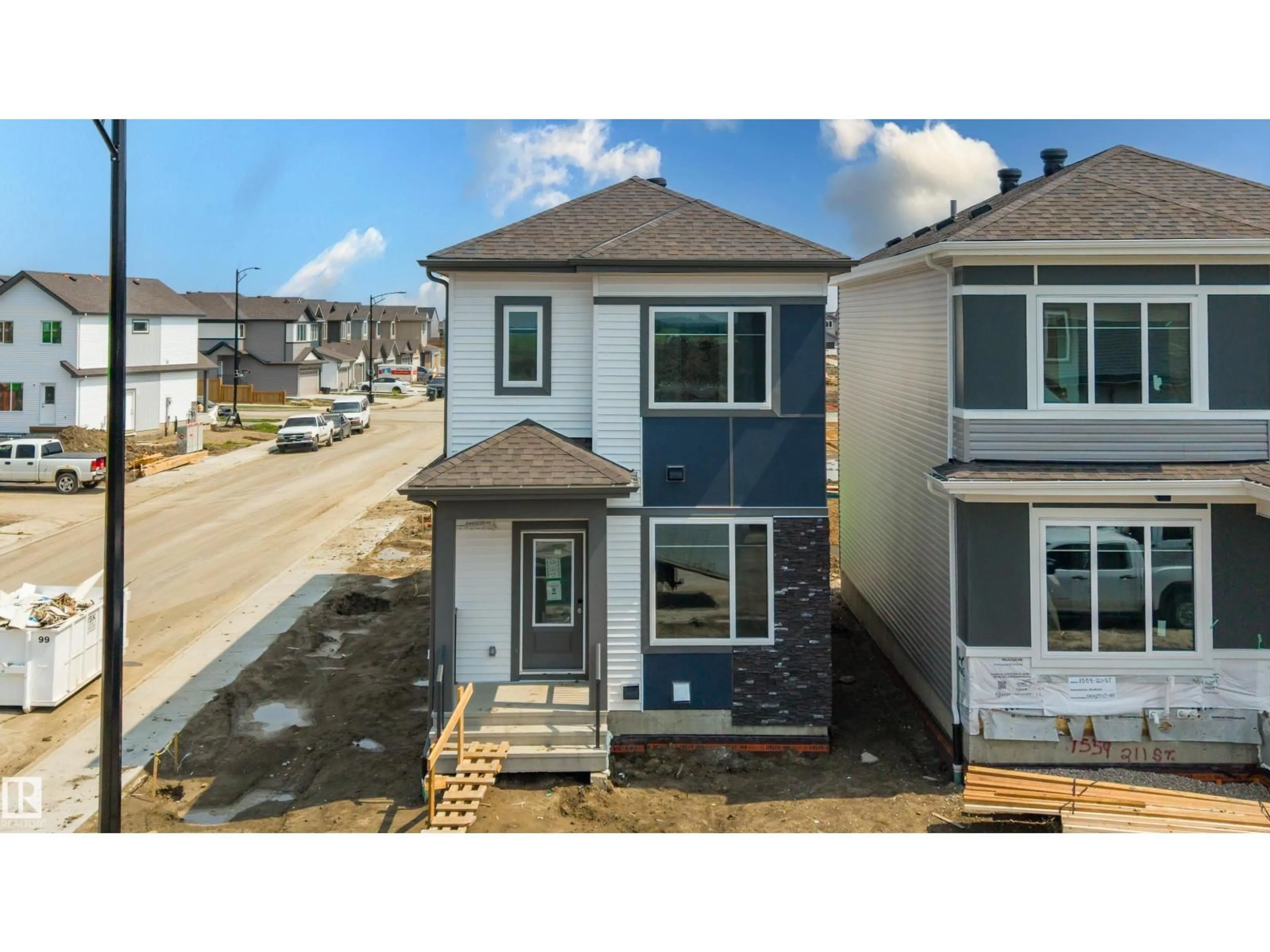 A pic from outside/outdoor area/front of a property/back of a property/a pic from drone, street for NW - 1563 211 ST, Edmonton Alberta T6M3P1
