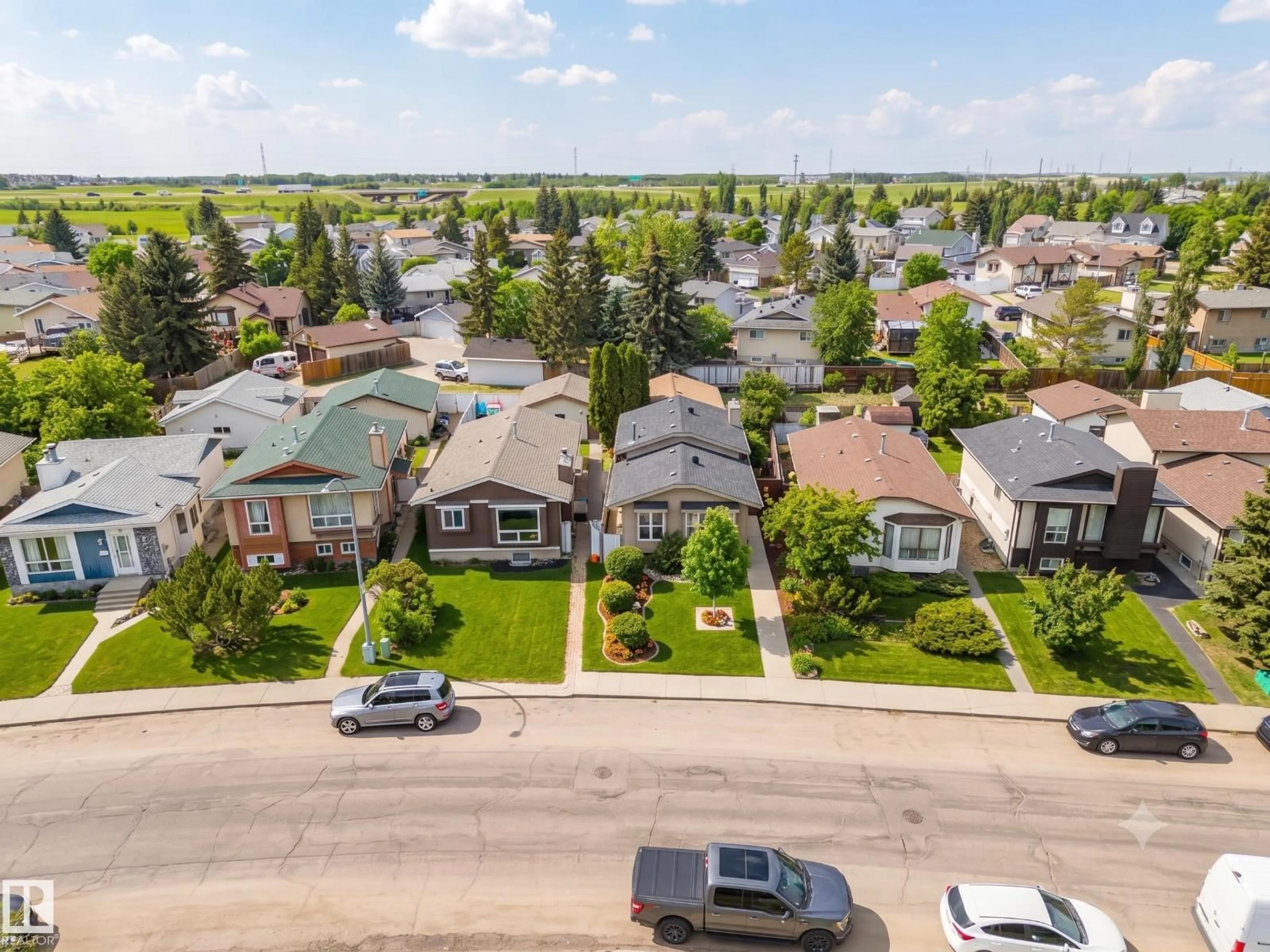 A pic from outside/outdoor area/front of a property/back of a property/a pic from drone, street for NW - 7422 188 ST, Edmonton Alberta T5T5J7