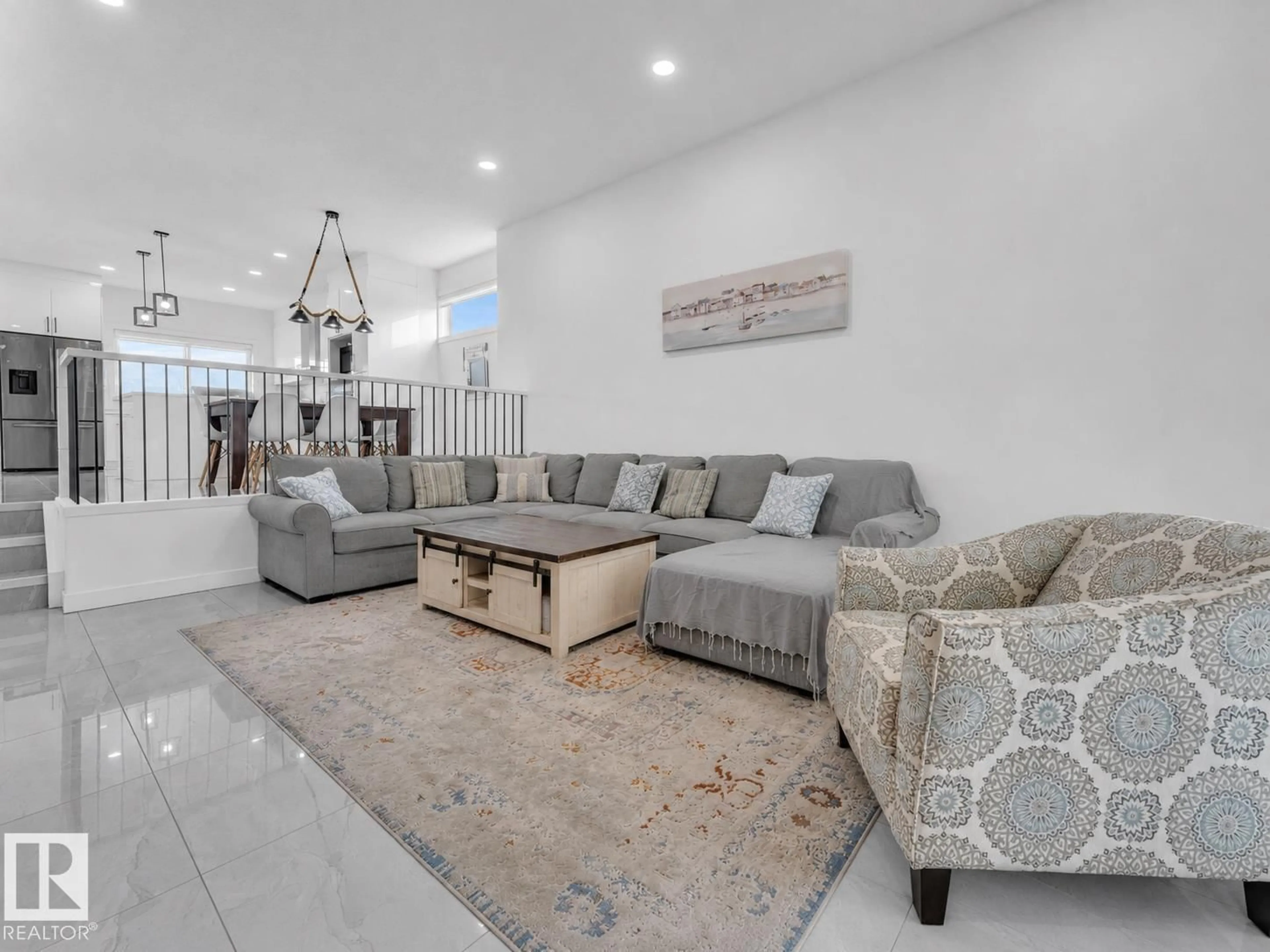 Living room with furniture, unknown for NW - 6099 180 AV, Edmonton Alberta T5Y3X1