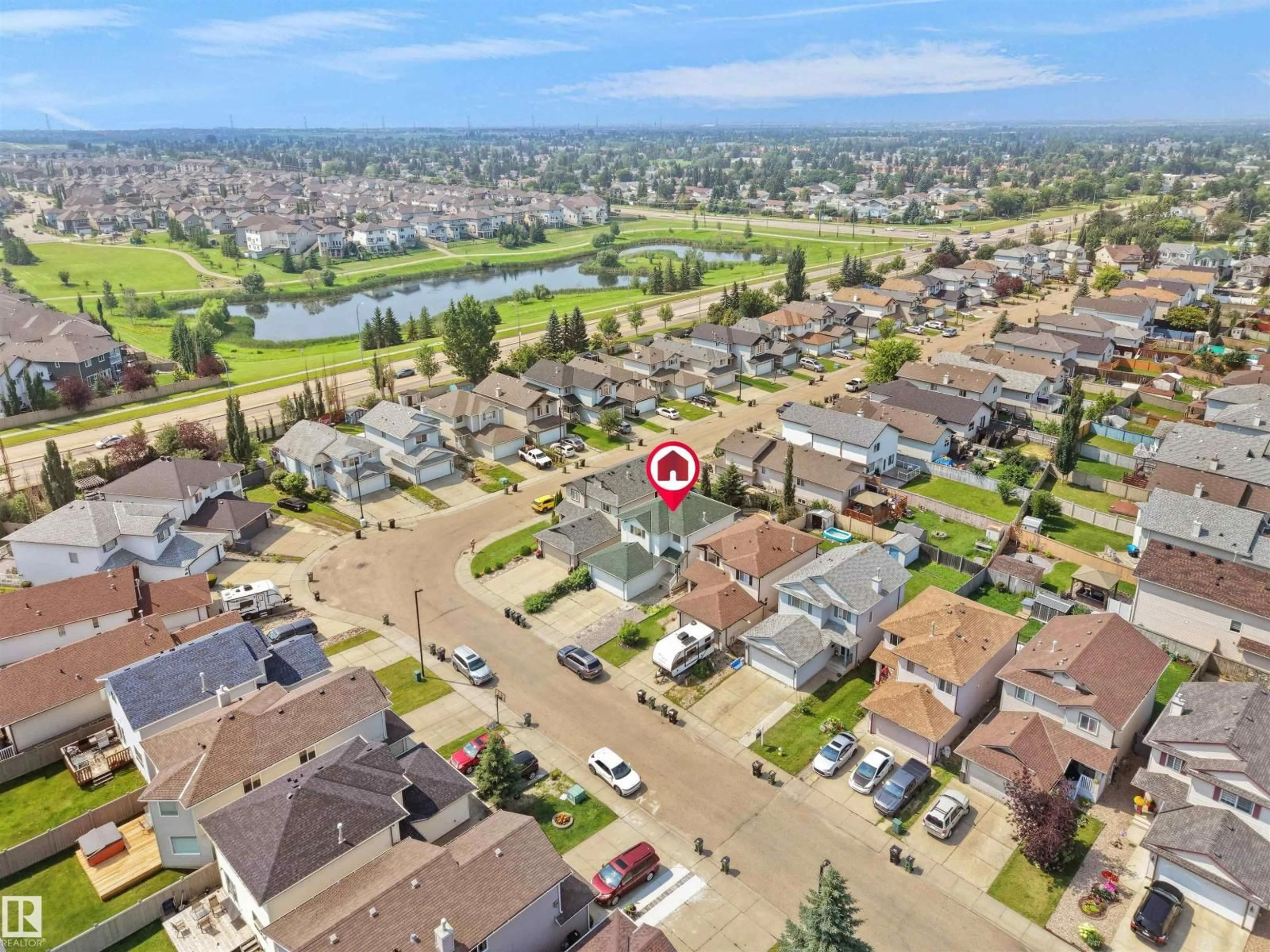 A pic from outside/outdoor area/front of a property/back of a property/a pic from drone, street for NW - 2410 32B ST, Edmonton Alberta T6T1Y6