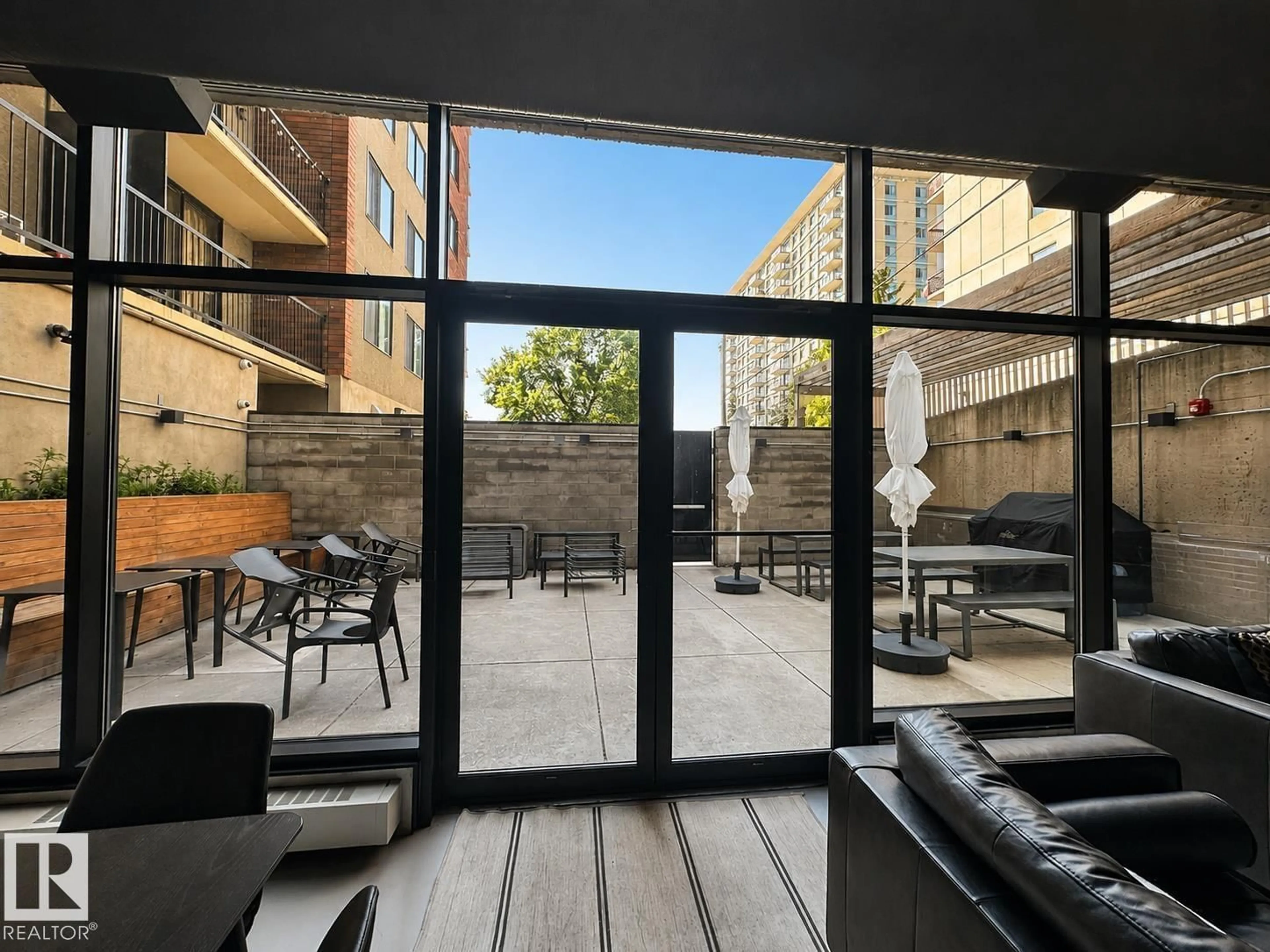 Patio, city buildings view from balcony for #301 - 9808 103 ST, Edmonton Alberta T5K2G4