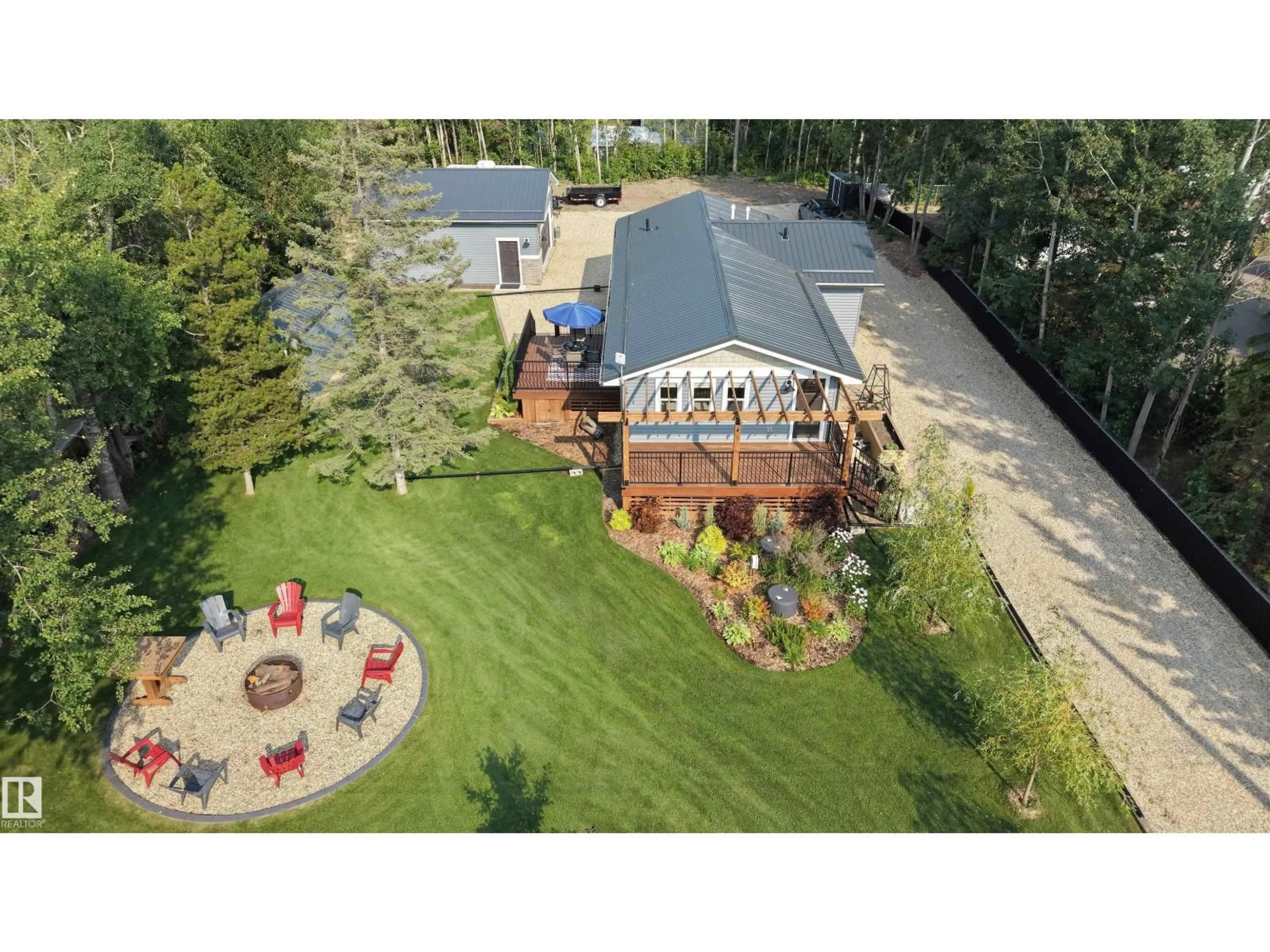 A pic from outside/outdoor area/front of a property/back of a property/a pic from drone, unknown for 701 - 55107 RGE ROAD 33, Rural Lac Ste. Anne County Alberta T0E0A0