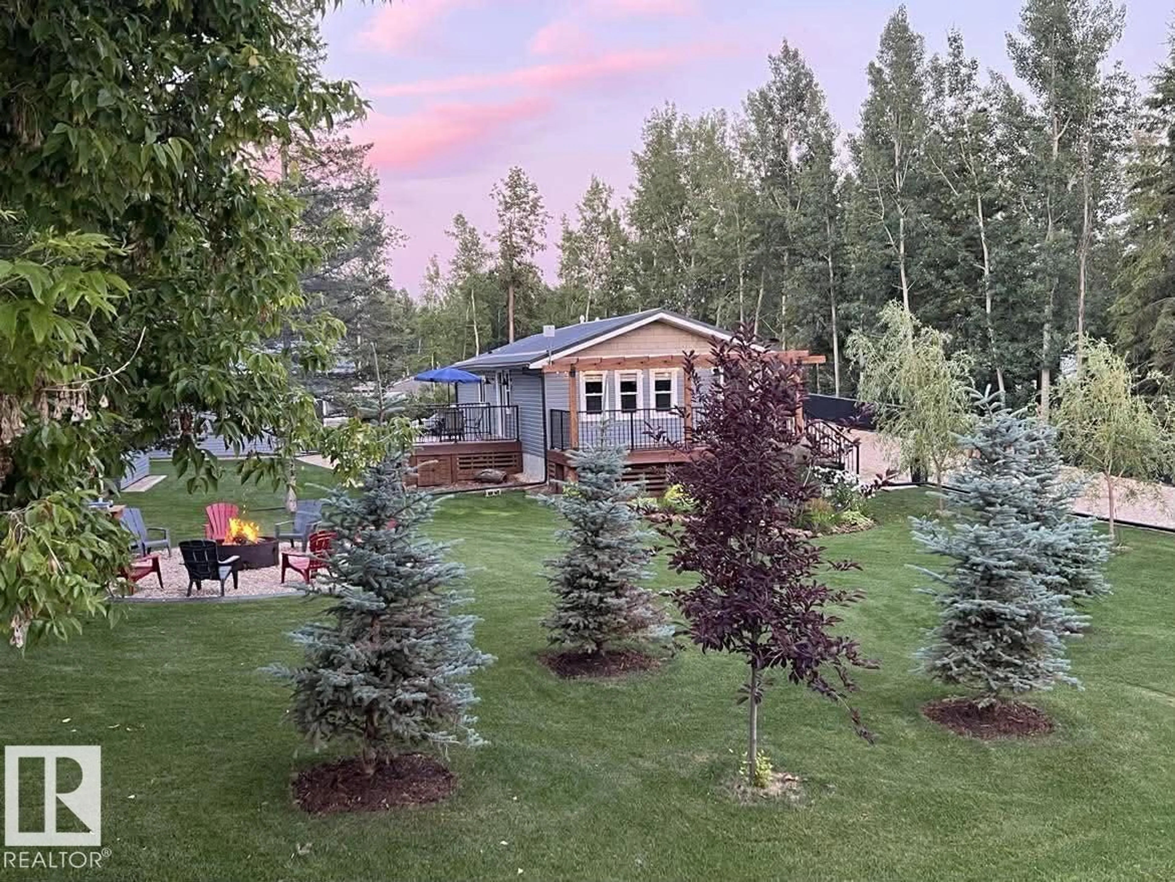 A pic from outside/outdoor area/front of a property/back of a property/a pic from drone, mountain view for 701 - 55107 RGE ROAD 33, Rural Lac Ste. Anne County Alberta T0E0A0