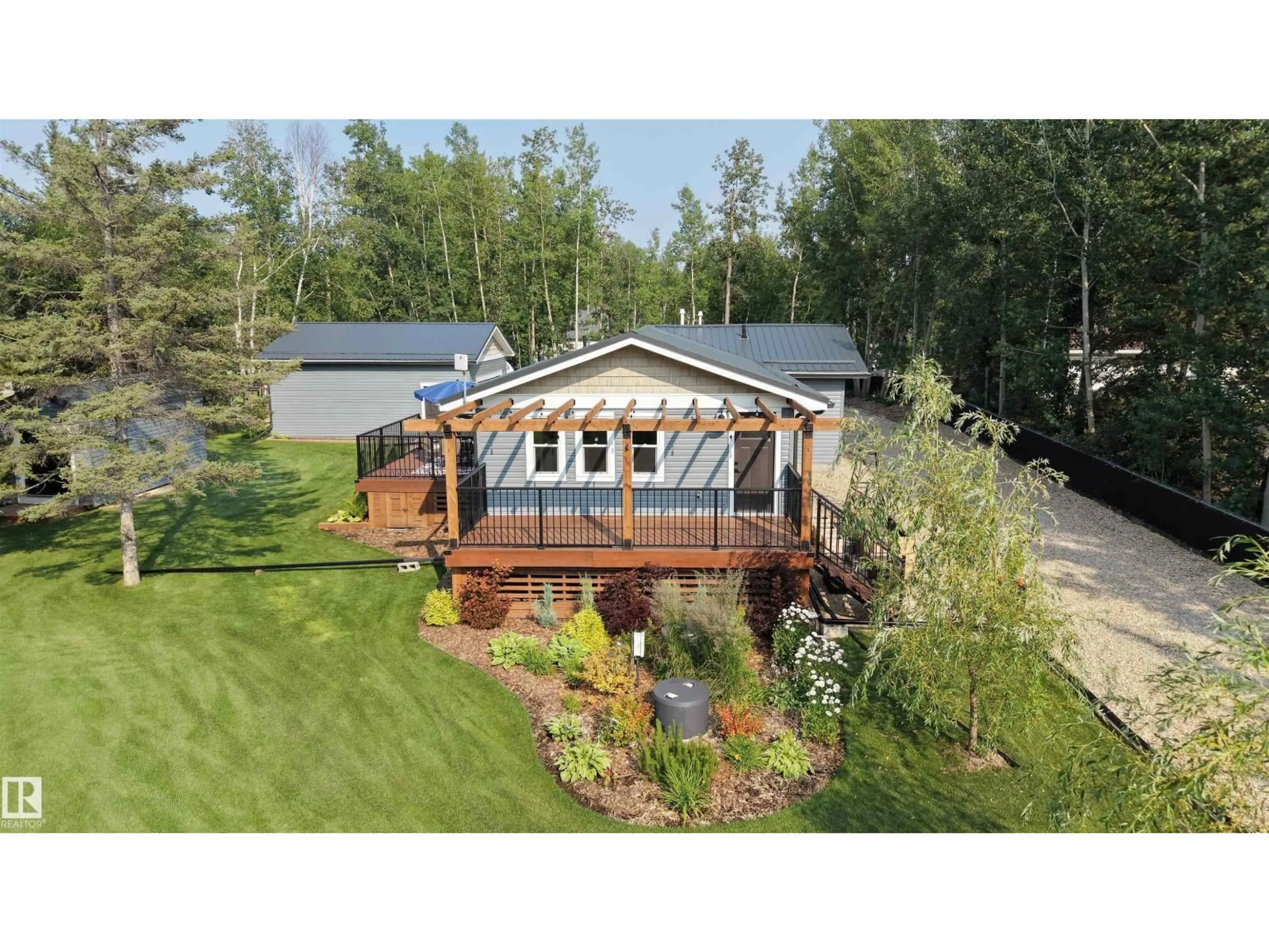 A pic from outside/outdoor area/front of a property/back of a property/a pic from drone, unknown for 701 - 55107 RGE ROAD 33, Rural Lac Ste. Anne County Alberta T0E0A0