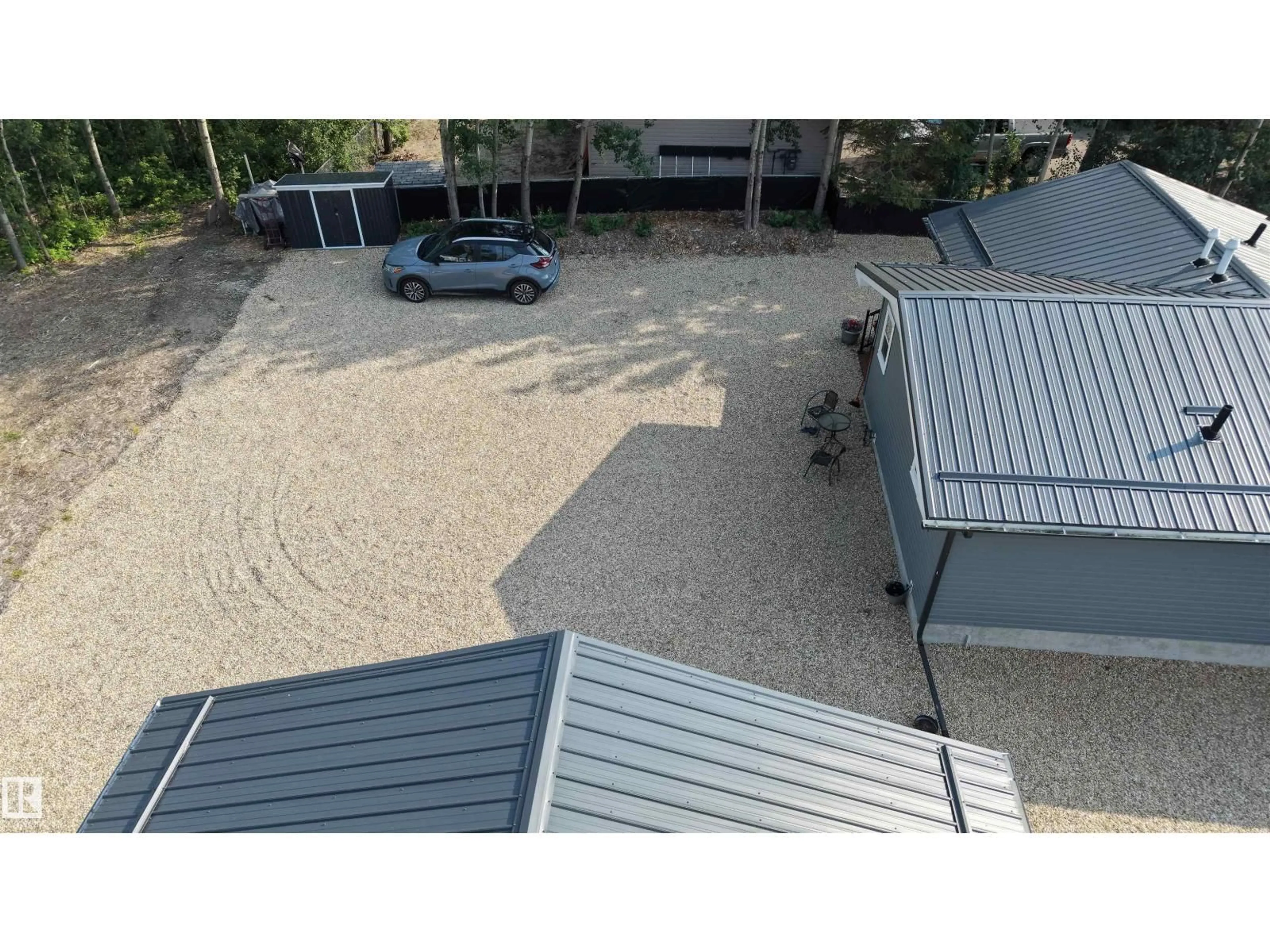 A pic from outside/outdoor area/front of a property/back of a property/a pic from drone, city buildings view from balcony for 701 - 55107 RGE ROAD 33, Rural Lac Ste. Anne County Alberta T0E0A0